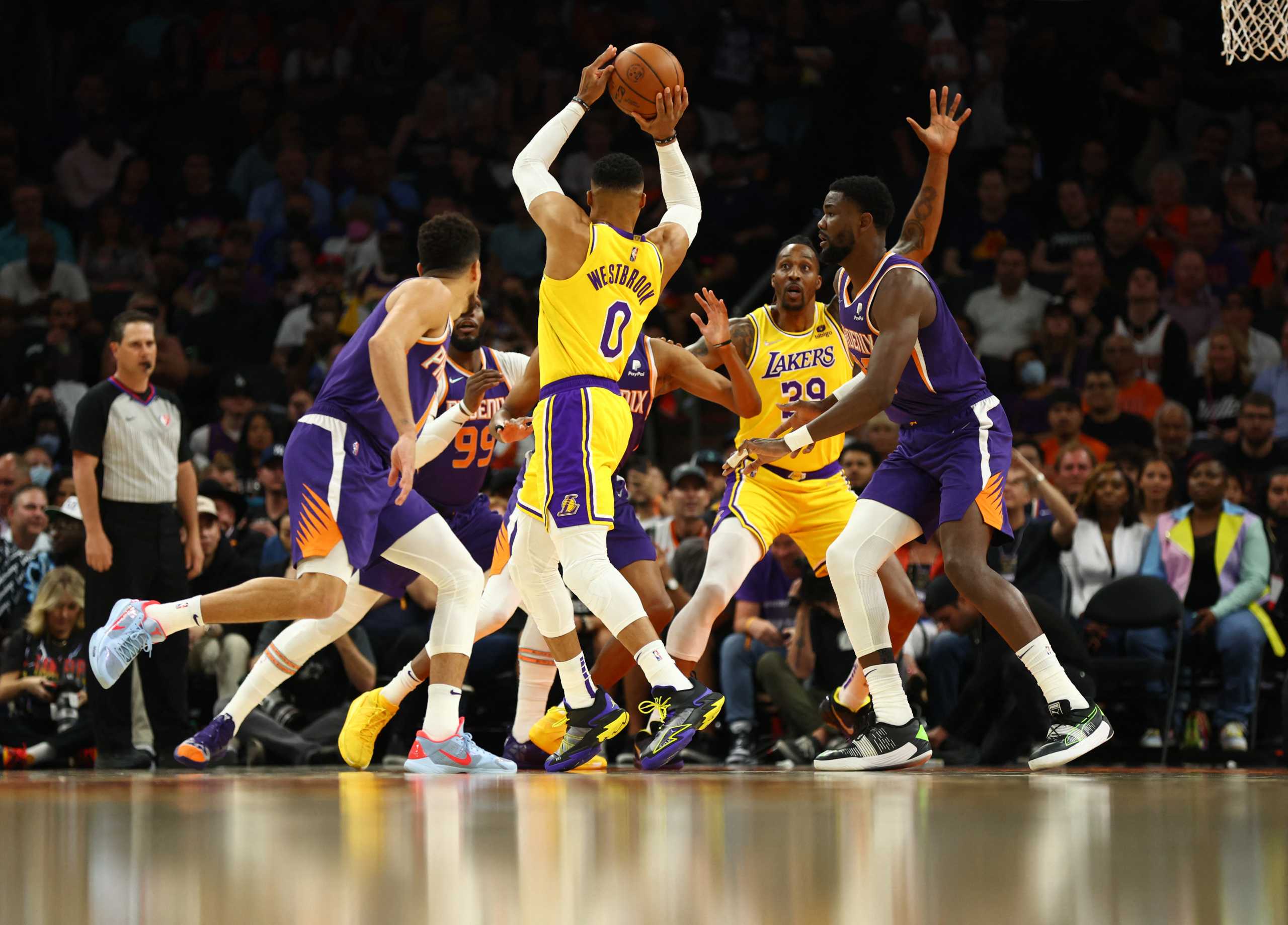Apr 5, 2022; Phoenix, Arizona, USA; Los Angeles Lakers guard Russell Westbrook (0) against the Phoenix Suns in the first half at Footprint Center. Mandatory Credit: Mark J. Rebilas-USA TODAY Sports