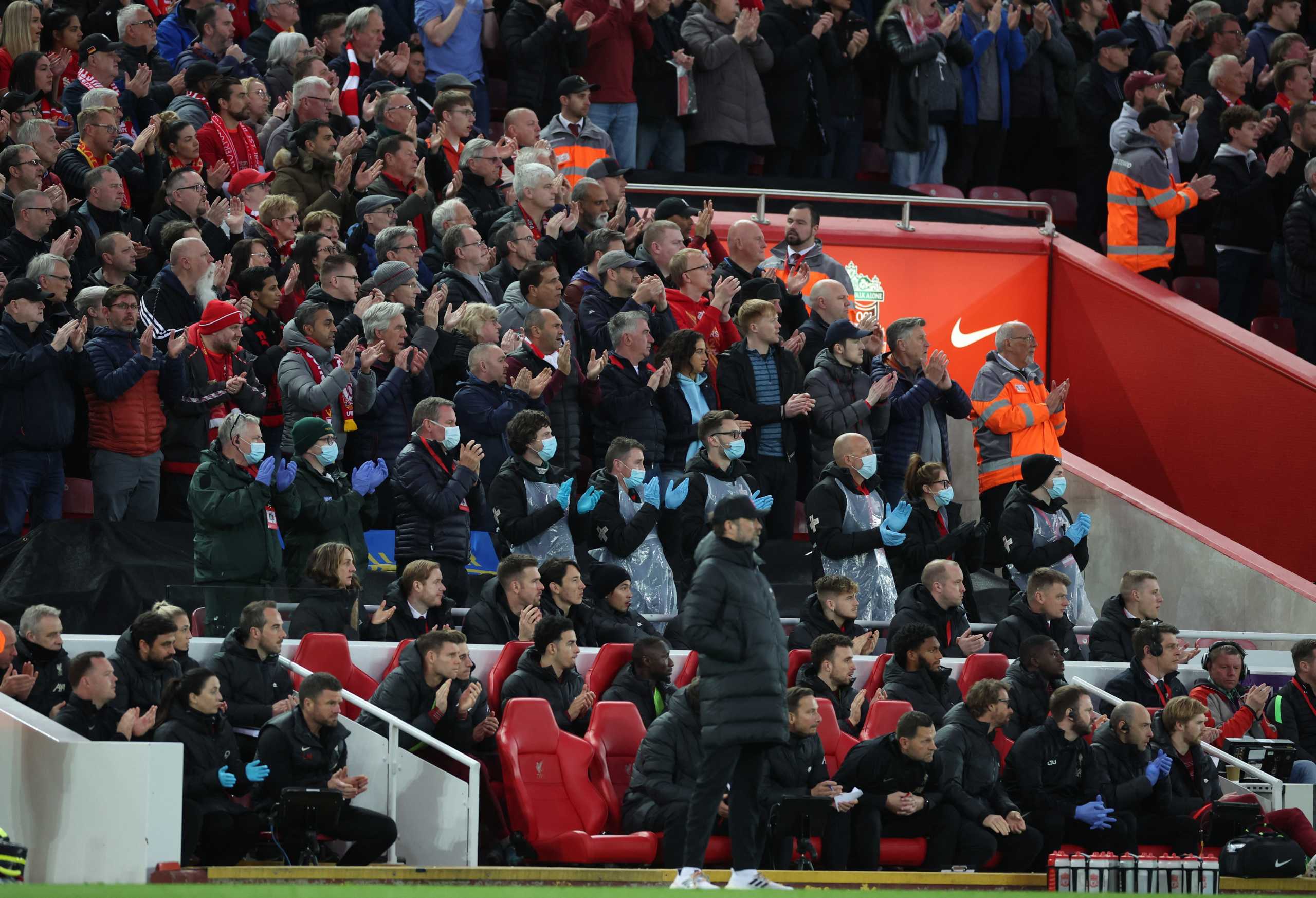 Soccer Football - Premier League - Liverpool v Manchester United - Anfield, Liverpool, Britain - April 19, 2022 Liverpool fans applaud on the seventh minute for Manchester United 's Cristiano Ronaldo and his family REUTERS