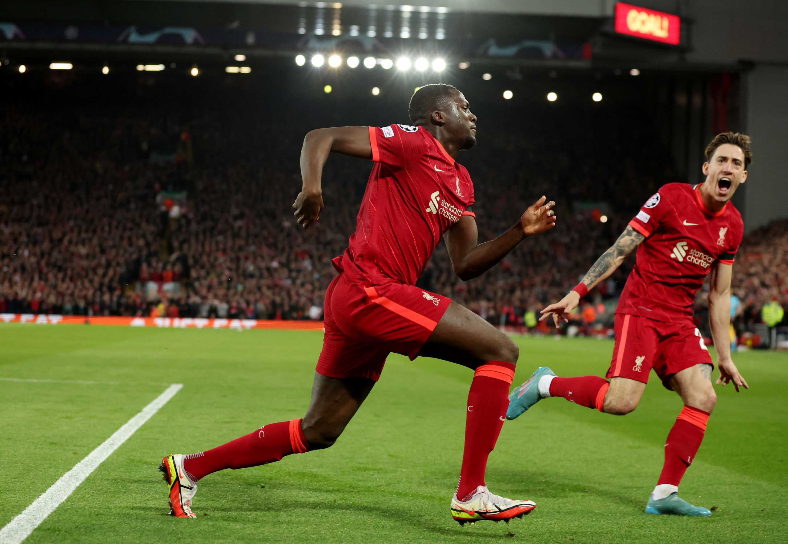 Soccer Football - Champions League - Quarter Final - Second Leg - Liverpool v Benfica - Anfield, Liverpool, Britain - April 13, 2022 Liverpool's Ibrahima Konate celebrates scoring their first goal with Kostas Tsimikas REUTERS