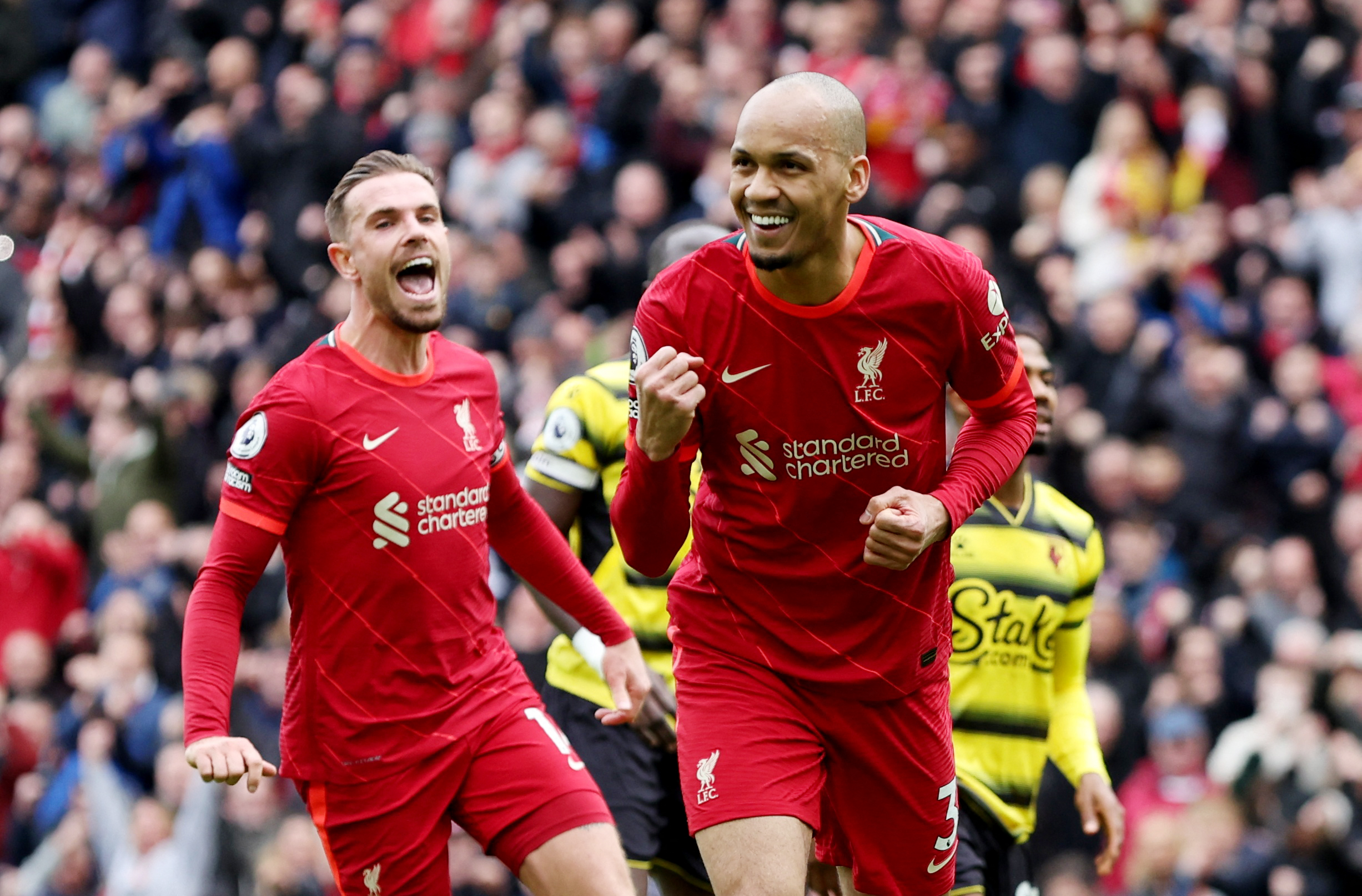 Soccer Football - Premier League - Liverpool v Watford - Anfield, Liverpool, Britain - April 2, 2022 Liverpool's Fabinho celebrates scoring their second goal with Jordan Henderson REUTERS