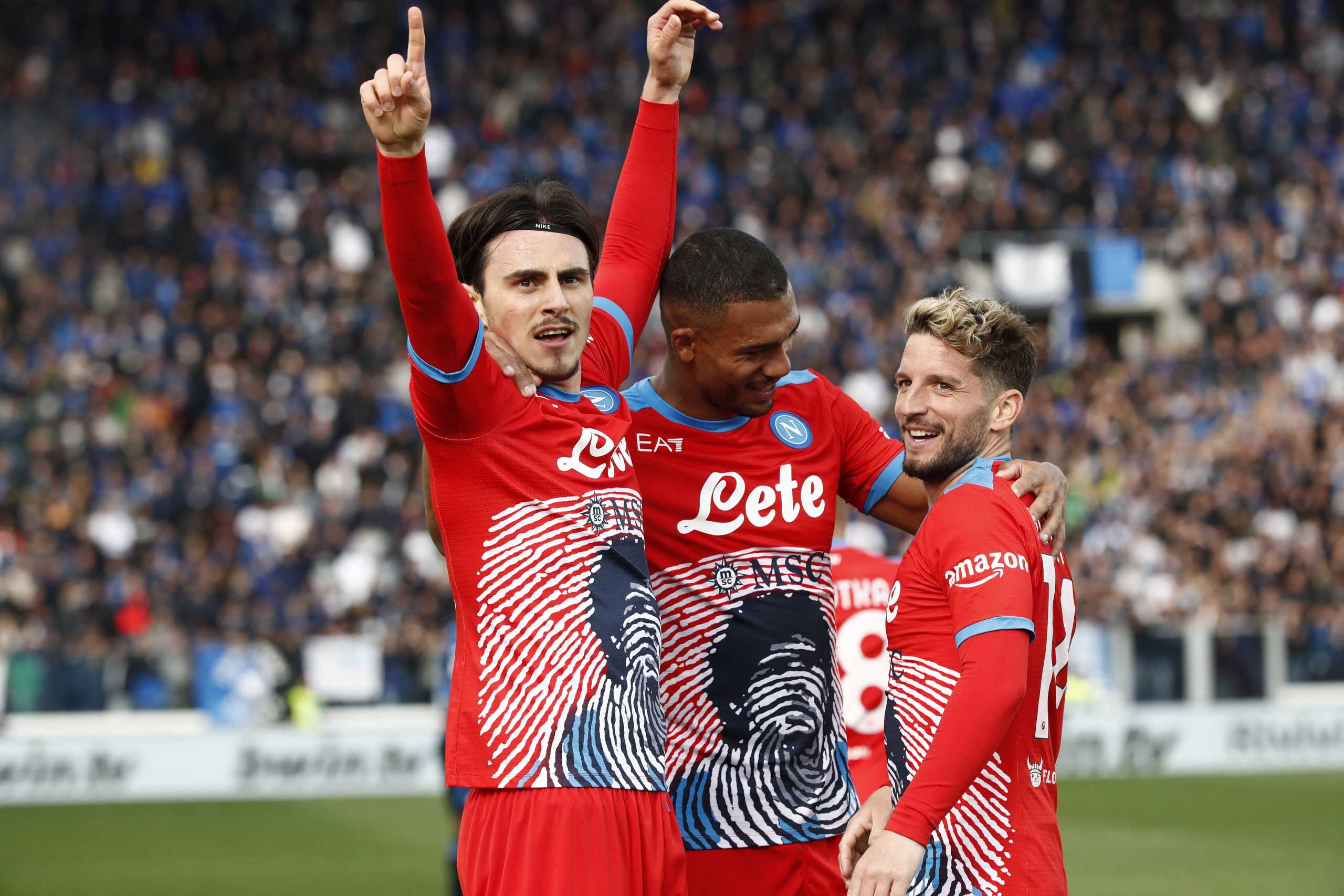 Soccer Football - Serie A - Atalanta v Napoli - Stadio Atleti Azzurri, Bergamo, Italy - April 3, 2022 Napoli's Eljif Elmas celebrates scoring their third goal with Juan Jesus and Dries Mertens REUTERS