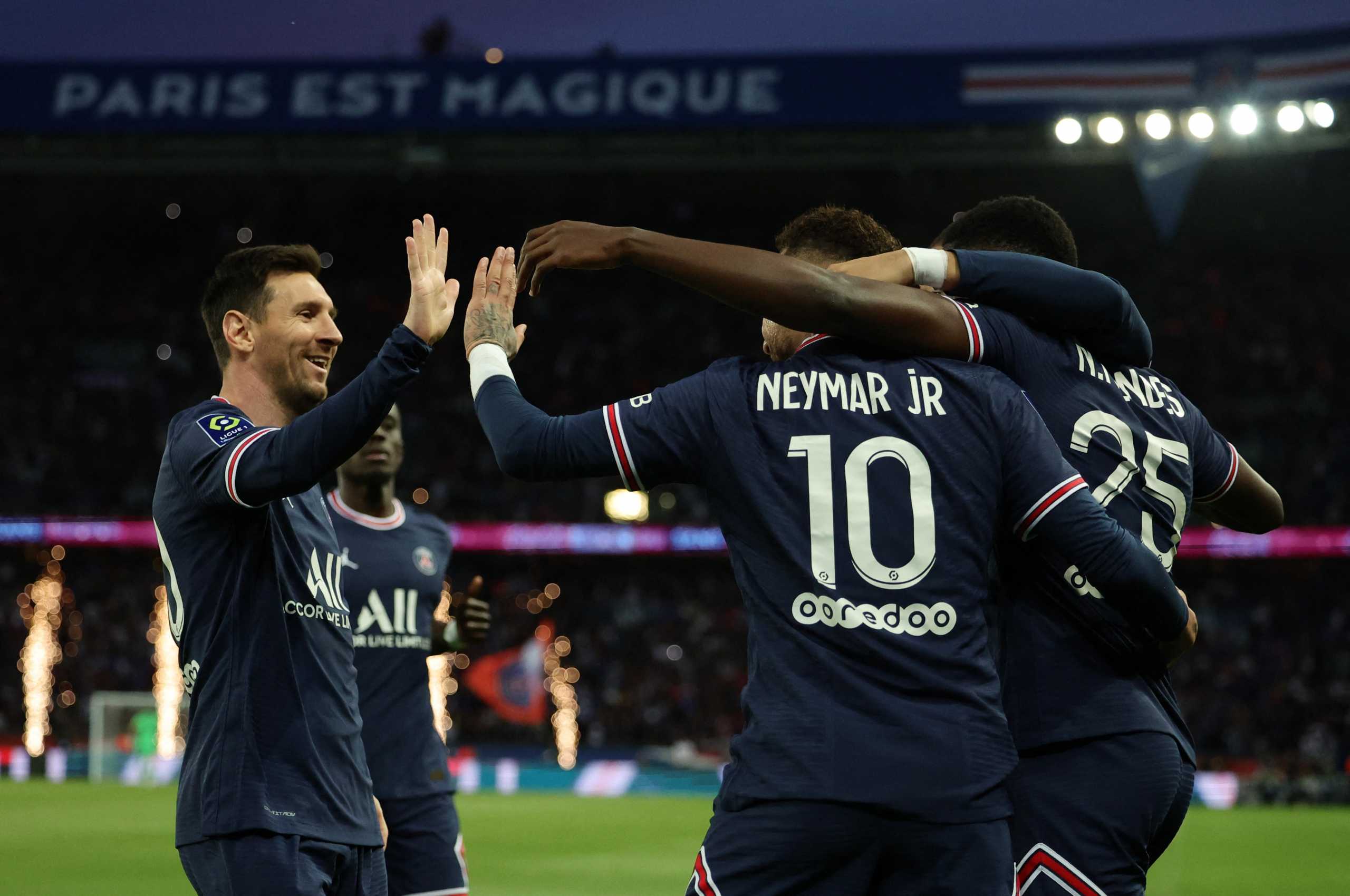 Soccer Football - Ligue 1 - Paris St Germain v Olympique de Marseille - Parc des Princes, Paris, France - April 17, 2022 Paris St Germain's Neymar celebrates scoring their first goal with Lionel Messi REUTERS
