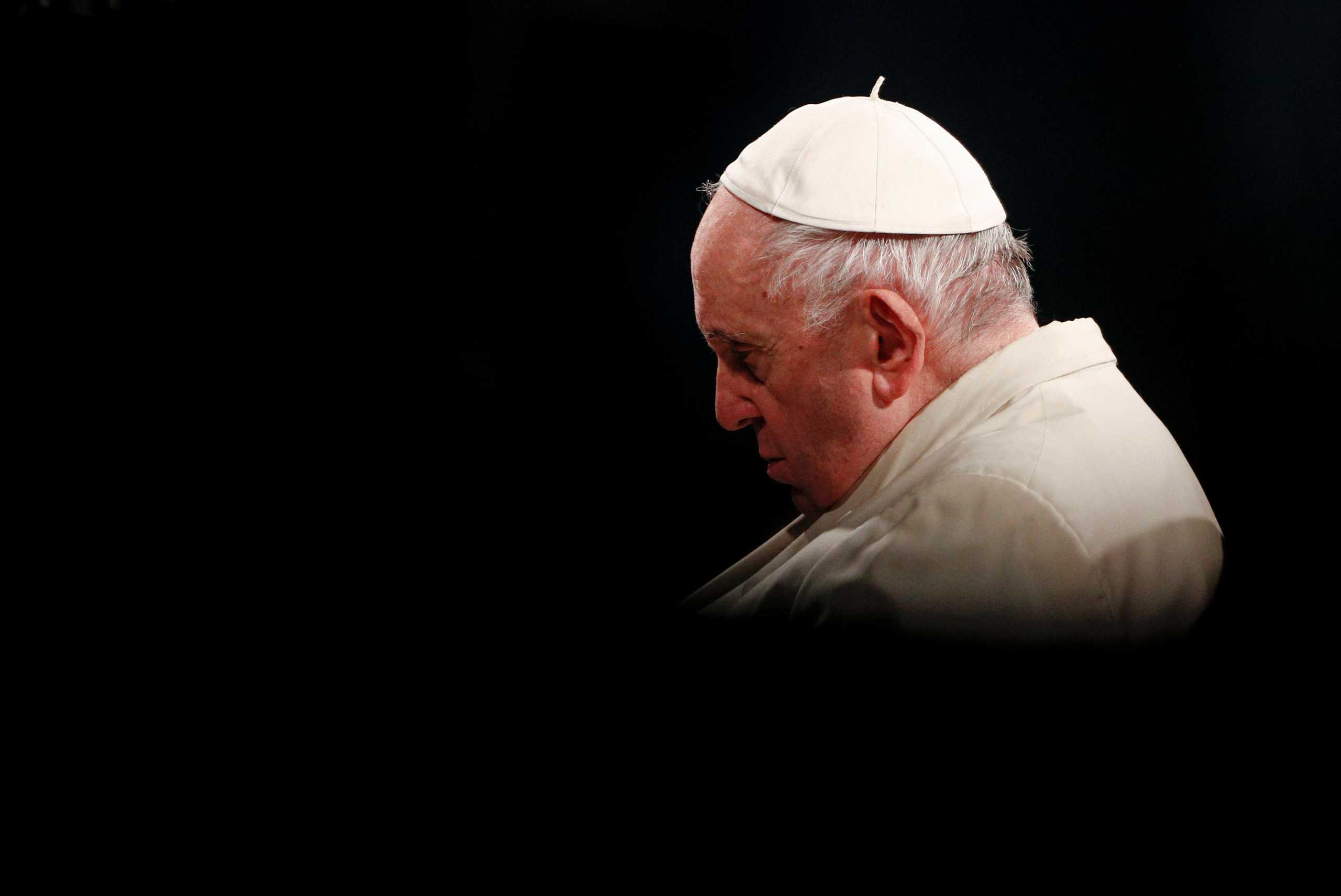 Pope Francis presides the Via Crucis (Way of the Cross) procession during Good Friday celebrations, at Colosseum, in Rome Italy April 15, 2022. REUTERS