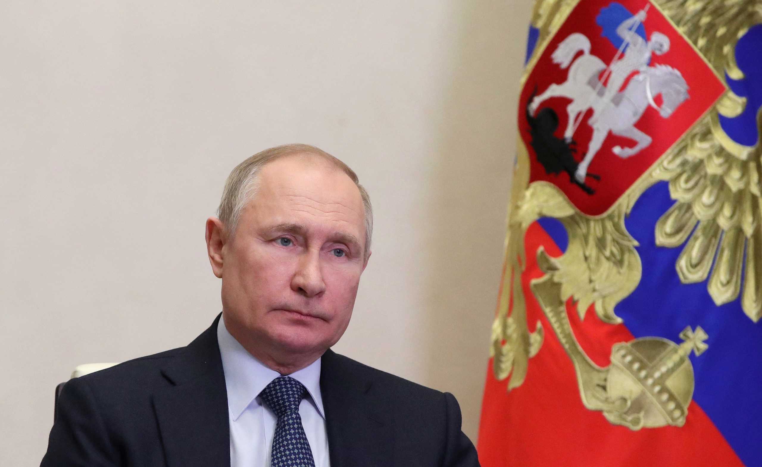 Russia's President Vladimir Putin chairs a meeting on the country's economy via a video link at a residence outside Moscow, Russia April 18, 2022. Sputnik