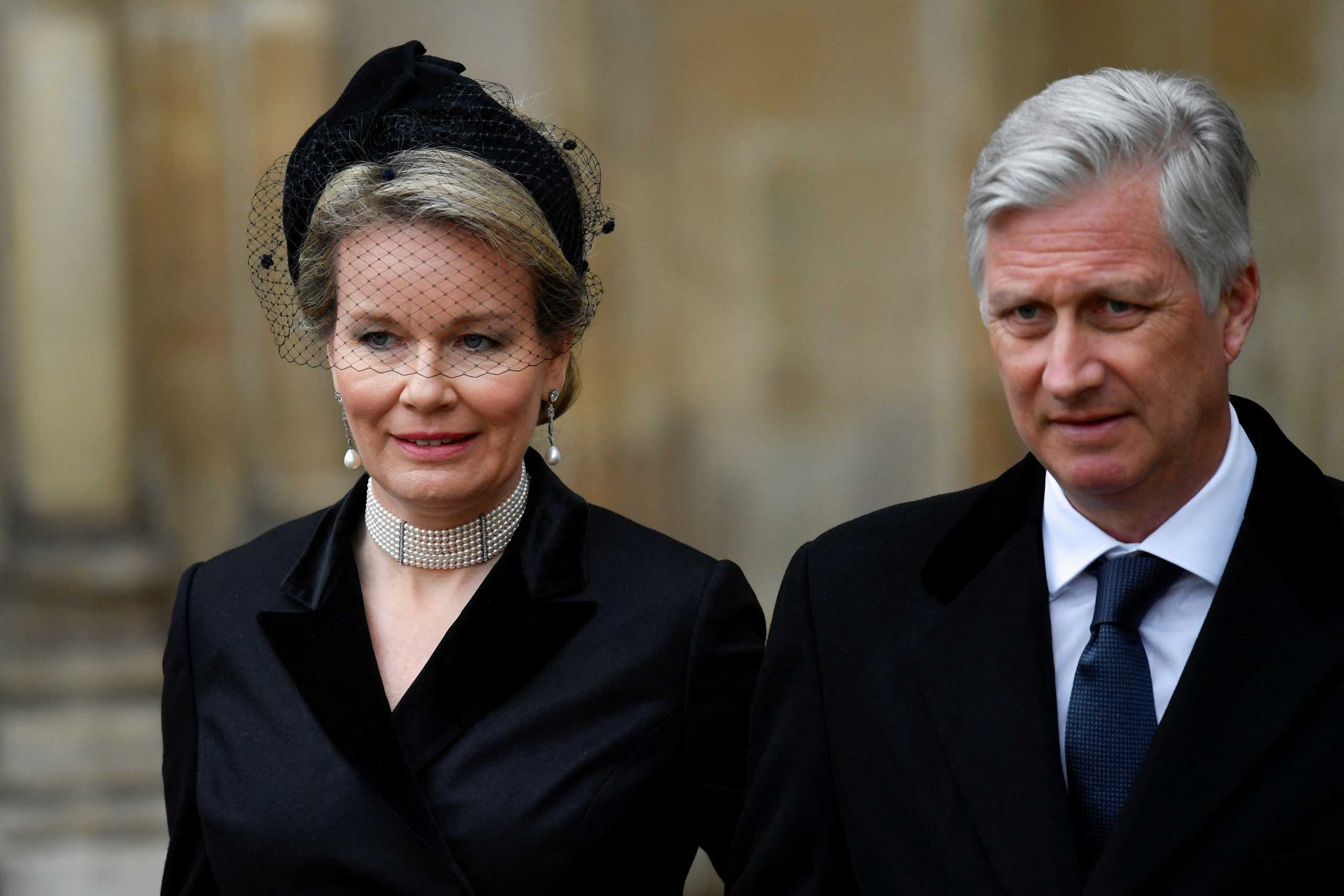 Belgium's Queen Mathilde and King Philippe leave after a service of thanksgiving for late Prince Philip, Duke of Edinburgh, at Westminster Abbey in London, Britain, March 29, 2022. REUTERS