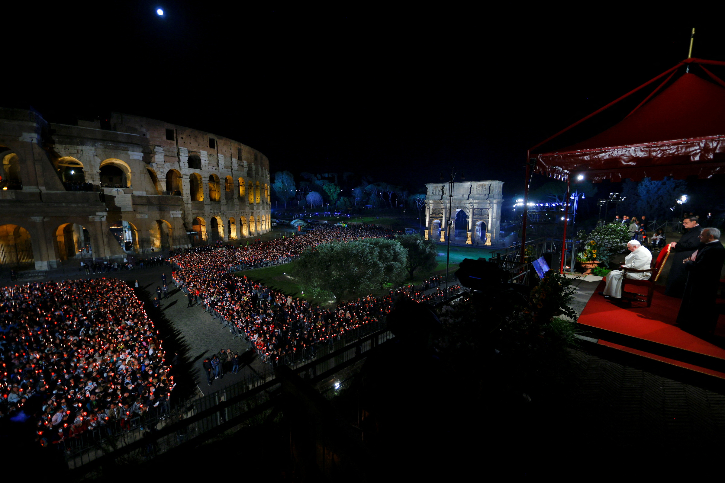 Pope Francis presides the Via Crucis (Way of the Cross) procession during Good Friday celebrations, at Colosseum, in Rome Italy April 15, 2022. REUTERS