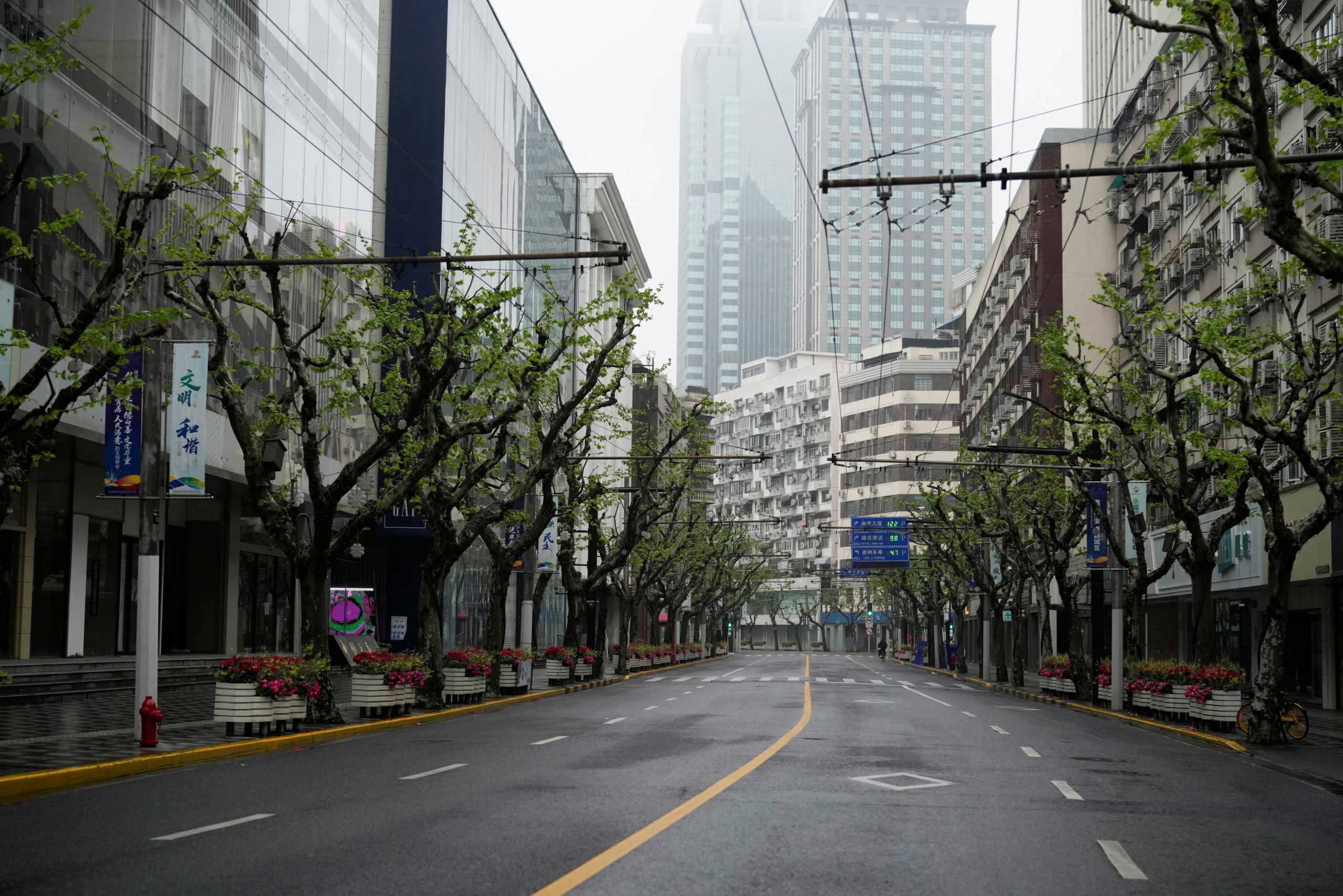 An empty road is seen during lockdown amid the coronavirus disease (COVID-19) pandemic, in Shanghai, China April 14, 2022. REUTERS