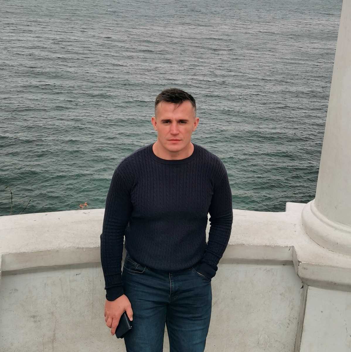 Andrei Shestakov, a history teacher and former police officer from eastern Russia who was prosecuted after expressing in public his opposition to Russia's war in Ukraine, poses in this undated handout picture. Andrei Shestakov