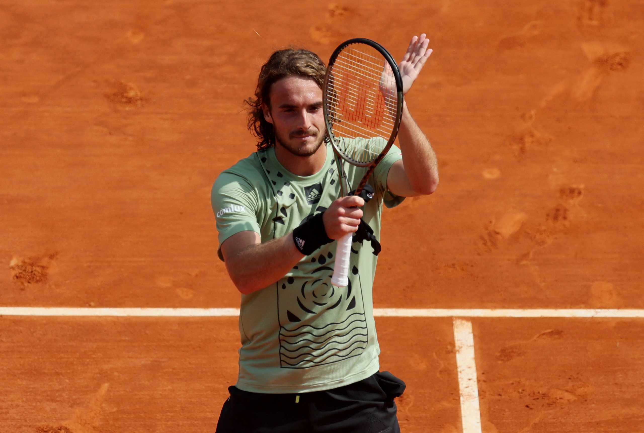 Tennis - ATP Masters 1000 - Monte Carlo Masters - Monte-Carlo Country Club, Roquebrune-Cap-Martin, France - April 14, 2022 Greece's Stefanos Tsitsipas celebrates after winning his third round match against Serbia's Laslo Dere REUTERS