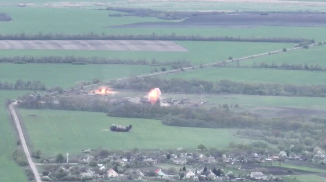 A still image shows a military strike purportedly carried out against a Russian armoured military convoy in a location given as near Izium, Ukraine in this screen grab obtained from a social media video released by National Guard Of Ukraine April 30, 2022. Courtesy of National Guard Of Ukraine