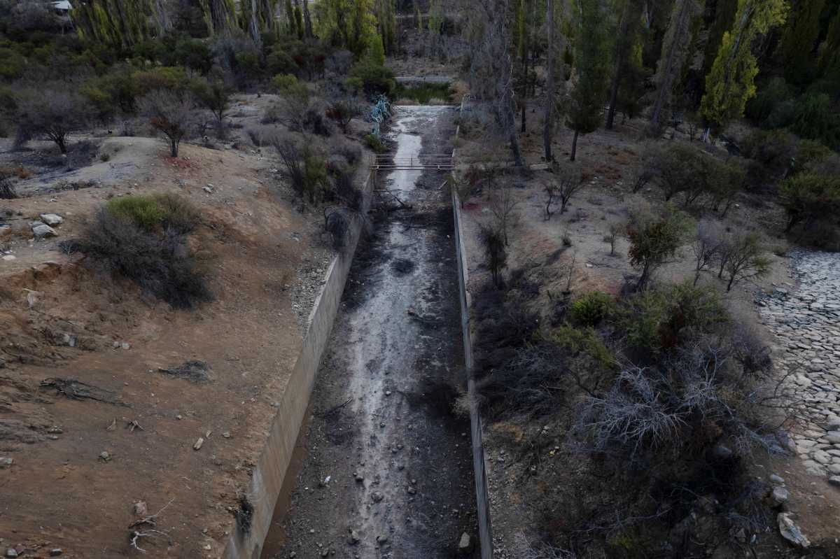 An aerial view of a dry structure at the Rungue reservoir during a drought in Rungue, north of Santiago, Chile, April 11, 2022. Image taken with a drone. REUTERS