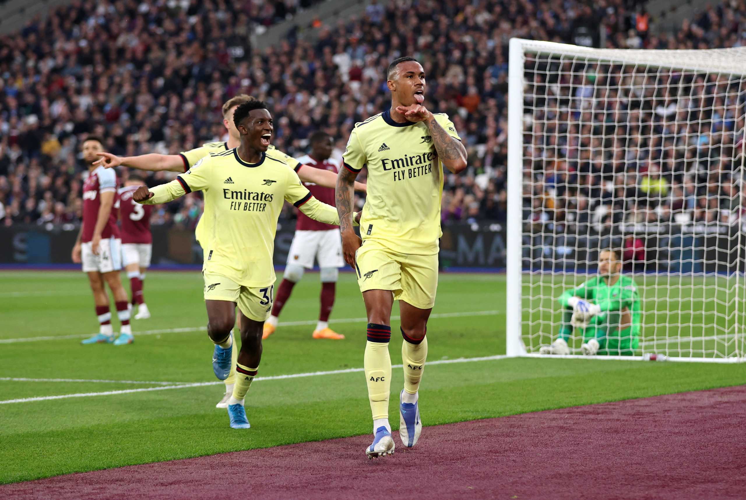 Soccer Football - Premier League - West Ham United v Arsenal - London Stadium, London, Britain - May 1, 2022 Arsenal's Gabriel celebrates scoring their second goal with Eddie Nketiah Action Images via Reuters