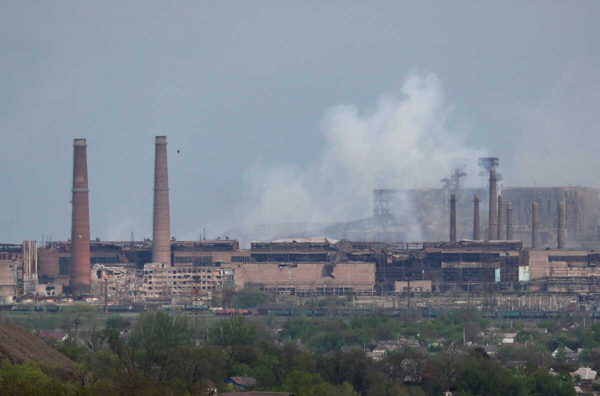 FILE PHOTO: Smoke rises above a plant of Azovstal Iron and Steel Works during Ukraine-Russia conflict in the southern port city of Mariupol, Ukraine May 5, 2022. Picture taken May 5, 2022. REUTERS