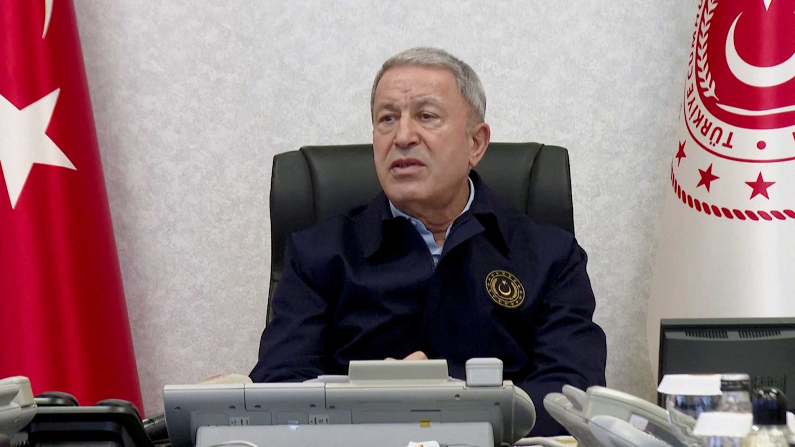Turkish Defence Minister Hulusi Akar speaks dring a meeting with military personnel at a command center, in Ankara, Turkey, in this still image taken from a handout video released April 18, 2022. Turkish Defence Ministry