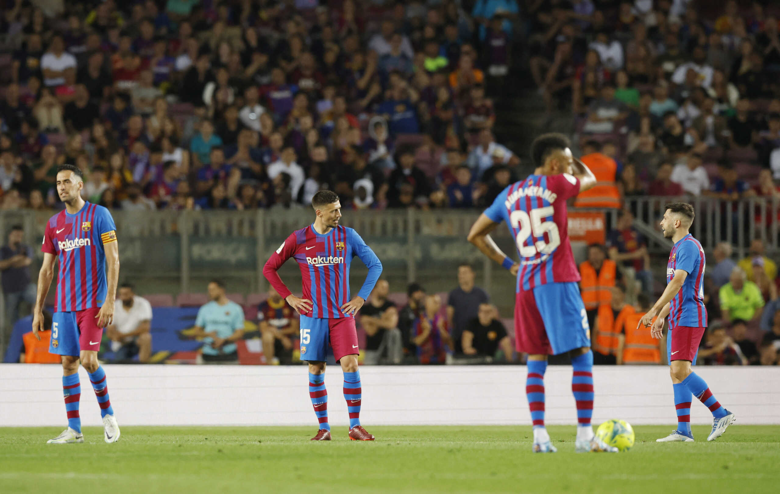 Soccer Football - LaLiga - FC Barcelona v Villarreal - Camp Nou, Barcelona, Spain - May 22, 2022  FC Barcelona's Clement Lenglet and Sergio Busquets react after Villarreal's Alfonso Pedraza scored their first goal REUTERS