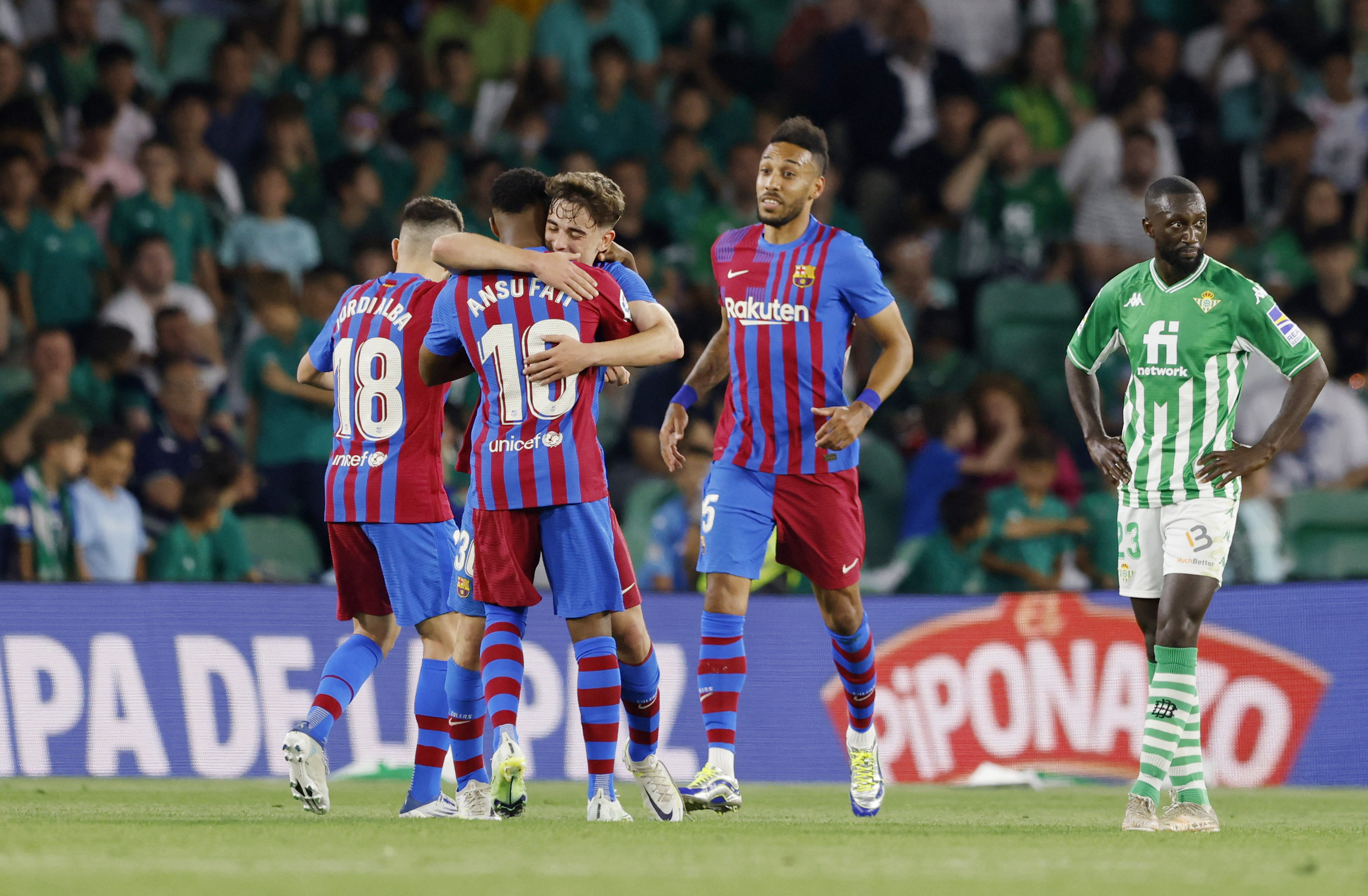 Soccer Football - LaLiga - Real Betis v FC Barcelona - Estadio Benito Villamarin, Seville, Spain - May 7, 2022 FC Barcelona's Ansu Fati celebrates scoring their first goal with Gavi REUTERS