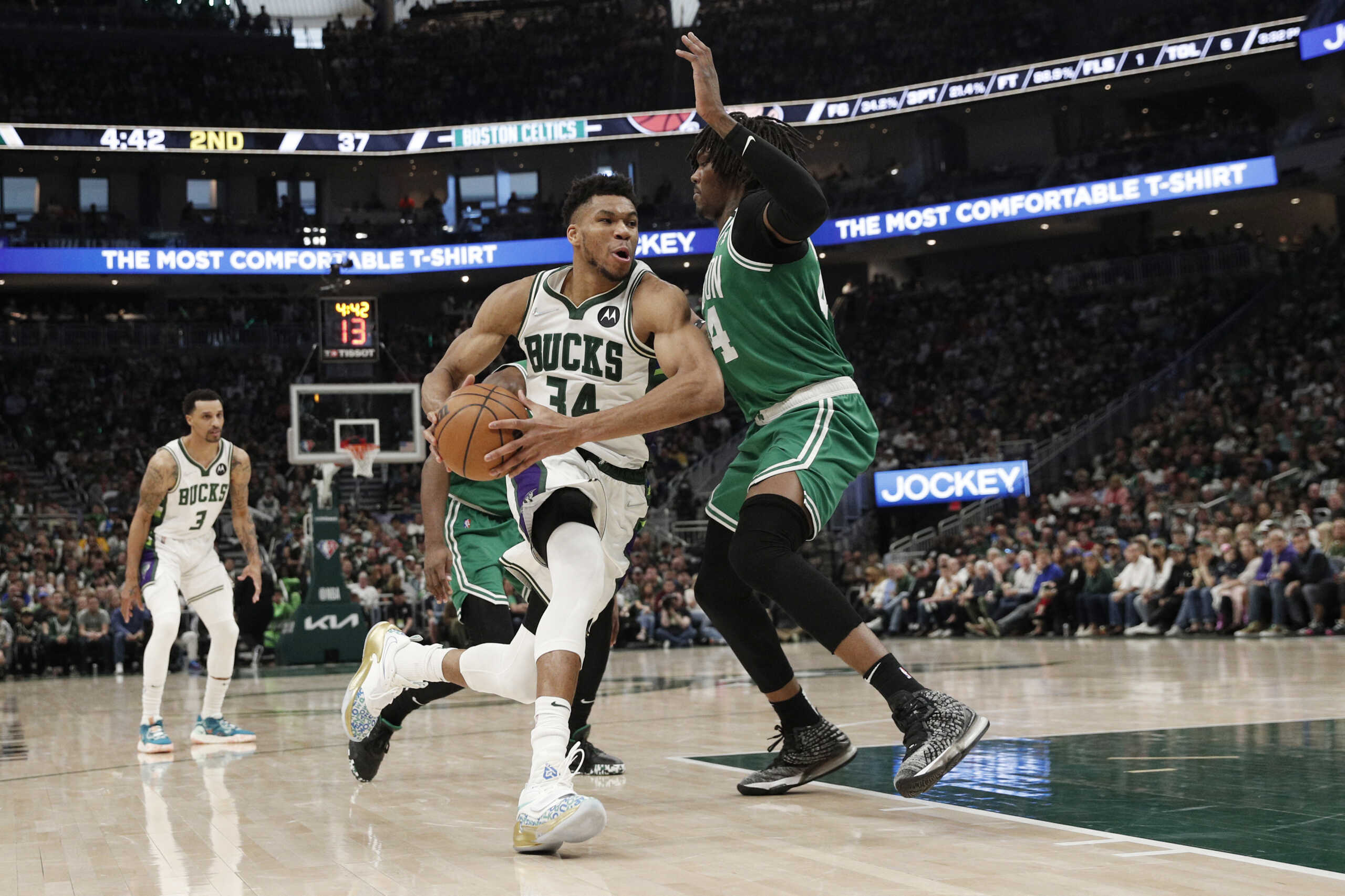 May 7, 2022; Milwaukee, Wisconsin, USA; Milwaukee Bucks forward Giannis Antetokounmpo (34) drives for the basket against Boston Celtics center Robert Williams III (44) during the second quarter during game three of the second round for the 2022 NBA playoffs at Fiserv Forum. Mandatory Credit: Jeff Hanisch-USA TODAY Sports