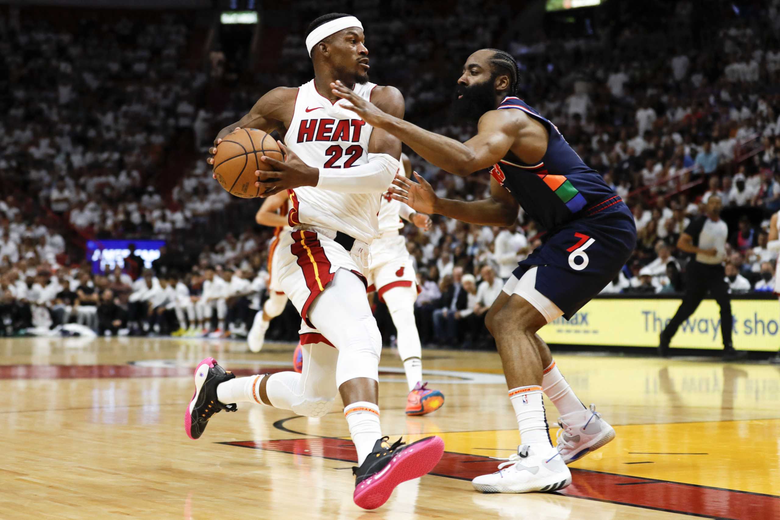 May 2, 2022; Miami, Florida, USA; Miami Heat forward Jimmy Butler (22) moves to the basket against Philadelphia 76ers guard James Harden (1) in the first quarter during game one of the second round for the 2022 NBA playoffs at FTX Arena. Mandatory Credit: Sam Navarro-USA TODAY Sports