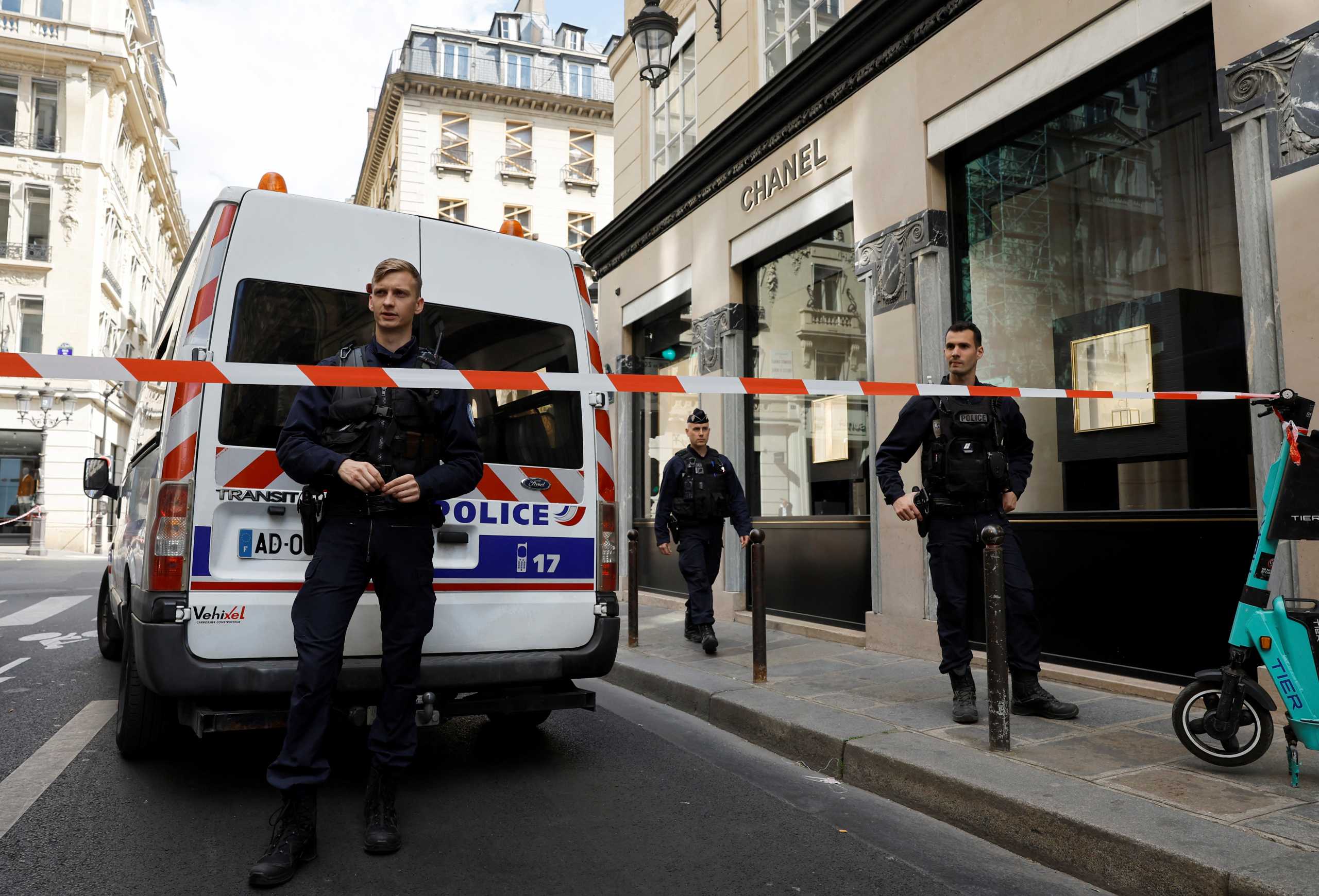 French police officers stand in front of the Chanel store following a robbery, next to the Place Vendome in Paris, France, May 5, 2022. REUTERS