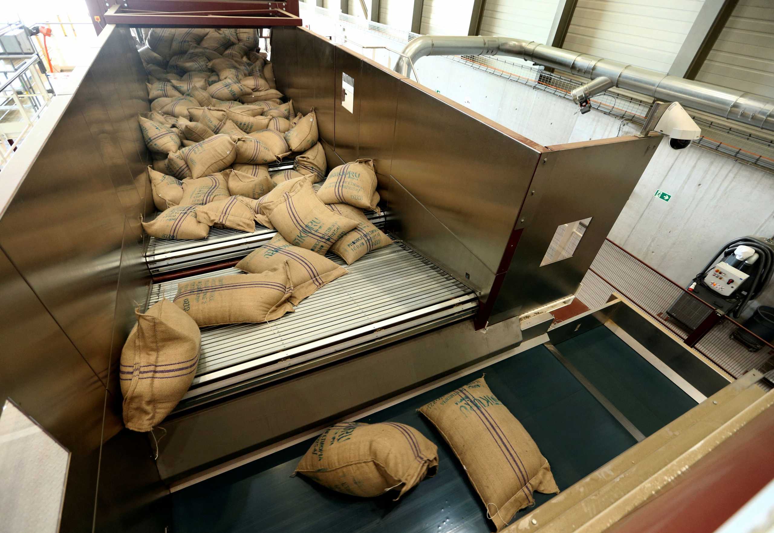 FILE PHOTO:  A container of green coffee beans from Ethiopia is unloaded at the Nespresso production plant, part of food giant Nestle, in Romont, Switzerland, August 30, 2016. REUTERS