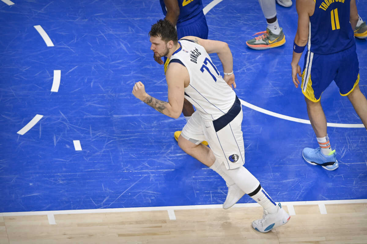 May 24, 2022; Dallas, Texas, USA; Dallas Mavericks guard Luka Doncic (77) celebrates during the fourth quarter against the Golden State Warriors in game four of the 2022 western conference finals at American Airlines Center. Mandatory Credit: Jerome Miron-USA TODAY Sports