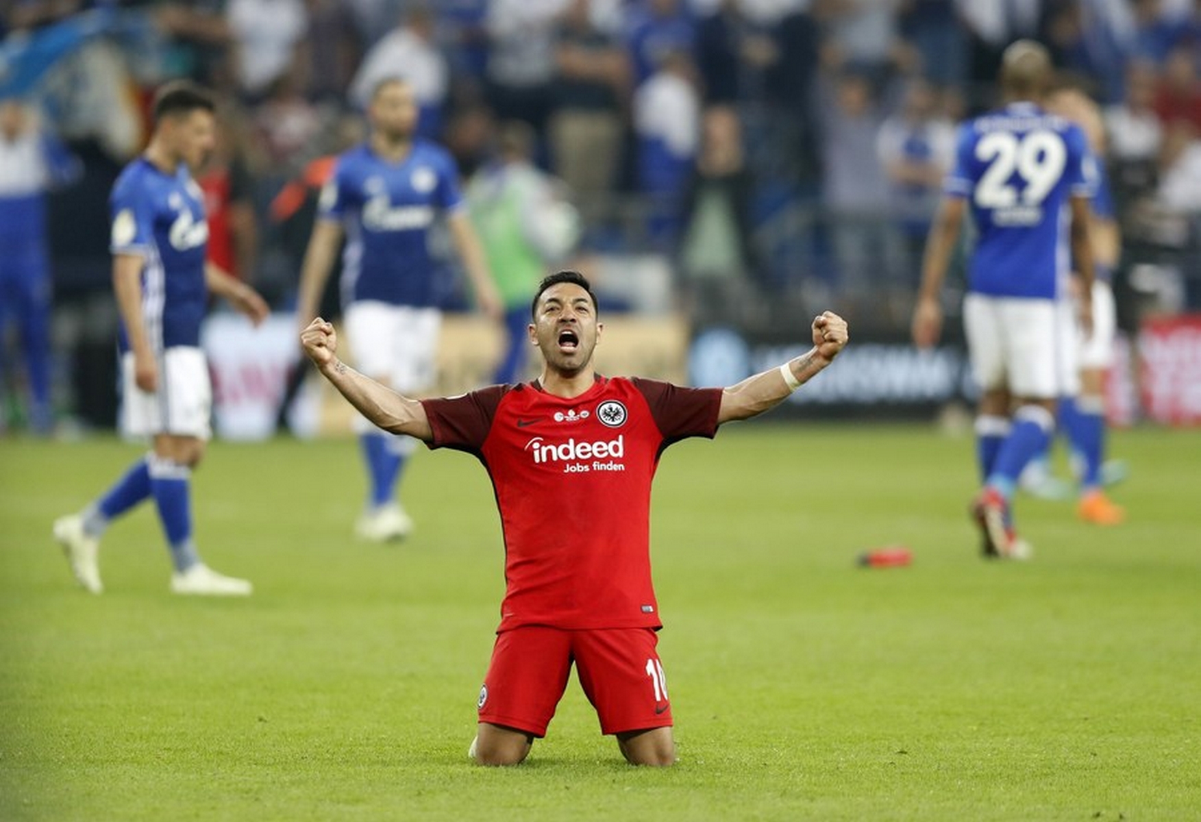 epa06678275 Frankfurt's Marco Fabian celebrates after winning the German DFB Cup semi final soccer match between FC Schalke 04 and Eintracht Frankfurt in Gelsenkirchen, Germany, 18 April 2018. (ATTENTION: The DFB prohibits the utilisation and publication of sequential pictures on the internet and other online media during the match (including half-time). ATTENTION: BLOCKING PERIOD! The DFB permits the further utilisation and publication of the pictures for mobile services (especially MMS) and for DVB-H and DMB only after the end of the match.  EPA
