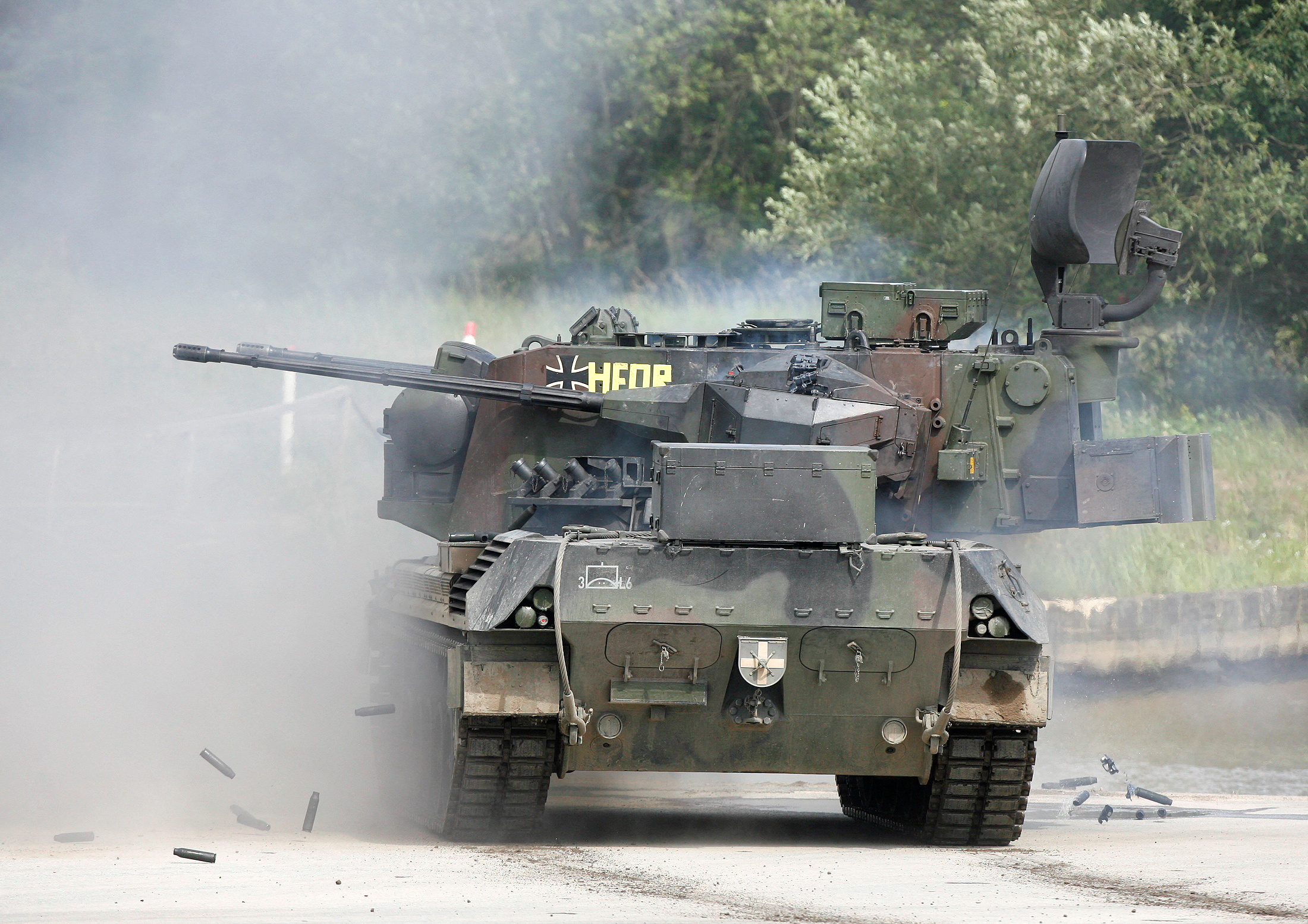 FILE PHOTO: The Gepard antiaircraft tank of the German armed forces Bundeswehr fires during a demonstration at the exercise area of Munster about 80 km south east of Hamburg June 20, 2007. REUTERS