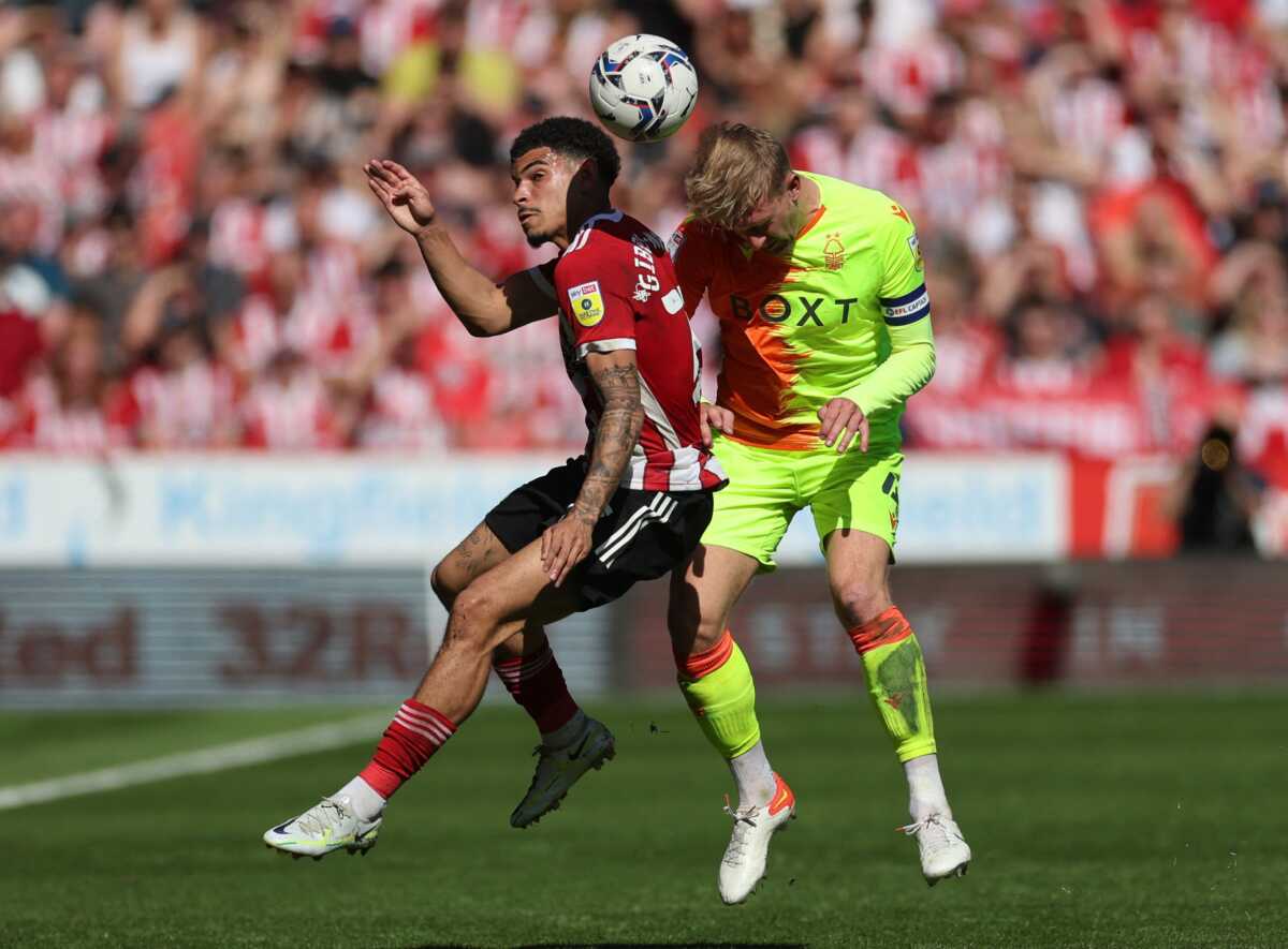 Soccer Football - Championship - Semi Final - First Leg - Sheffield United v Nottingham Forest - Bramall Lane, Sheffield, Britain - May 14, 2022 Nottingham Forest's Joe Worrall in action with Sheffield United's Morgan Gibbs-White Action Images via Reuters