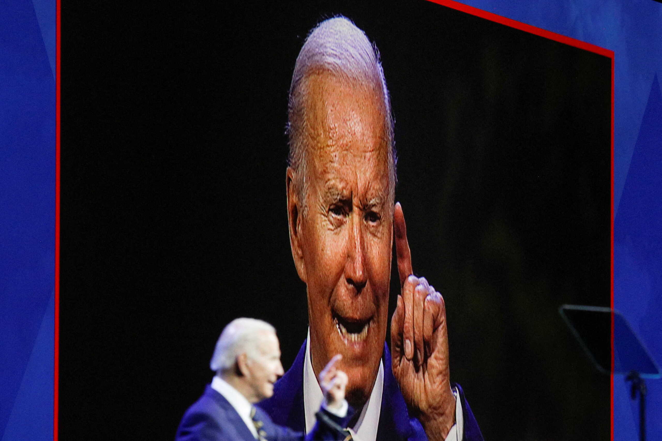 U.S. President Joe Biden is seen on a screen as he addresses the 40th convention of the International Brotherhood of Electrical Workers (IBEW) at McCormick Place in Chicago, Illinois, U.S., May 11, 2022. REUTERS