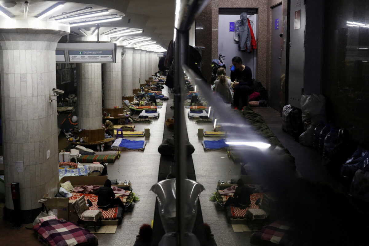 People find shelter from shelling in a metro station, amid Russia's attack on Ukraine, in Kharkiv, Ukraine, May 9, 2022. REUTERS