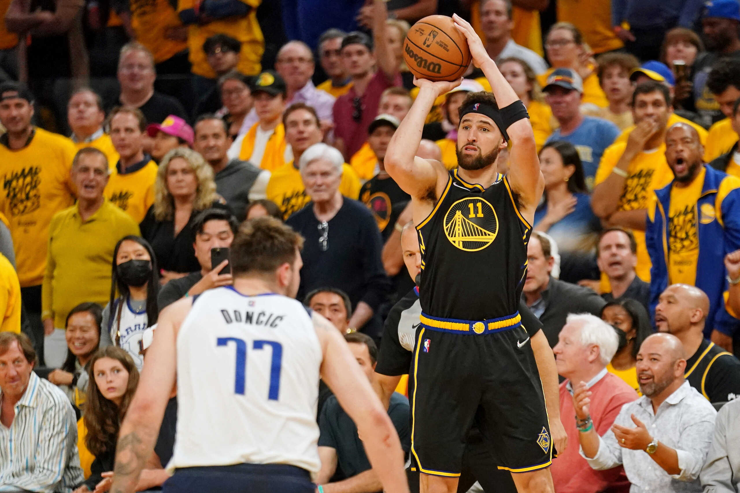 May 26, 2022; San Francisco, California, USA; Golden State Warriors guard Klay Thompson (11) shoots the ball against the Dallas Mavericks during the second half during game five of the 2022 western conference finals at Chase Center. Mandatory Credit: Cary Edmondson-USA TODAY Sports