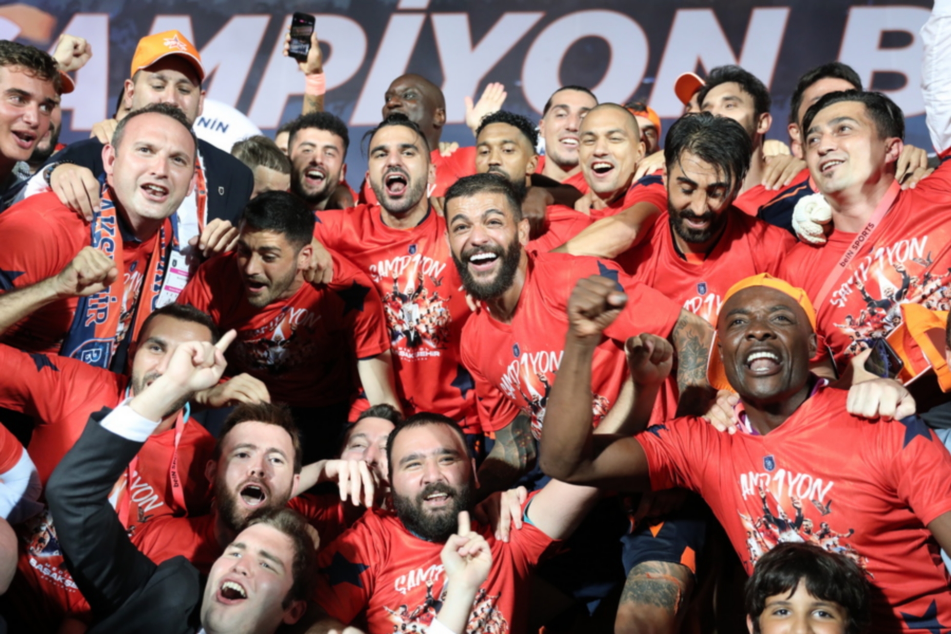 epa08555720 Basaksehir's players celebrate winning the Turkish Super League Championship after the Turkish Super League match between Basaksehir Istanbul and Kayserispor in Istanbul, Turkey, 19 July 2020.  EPA