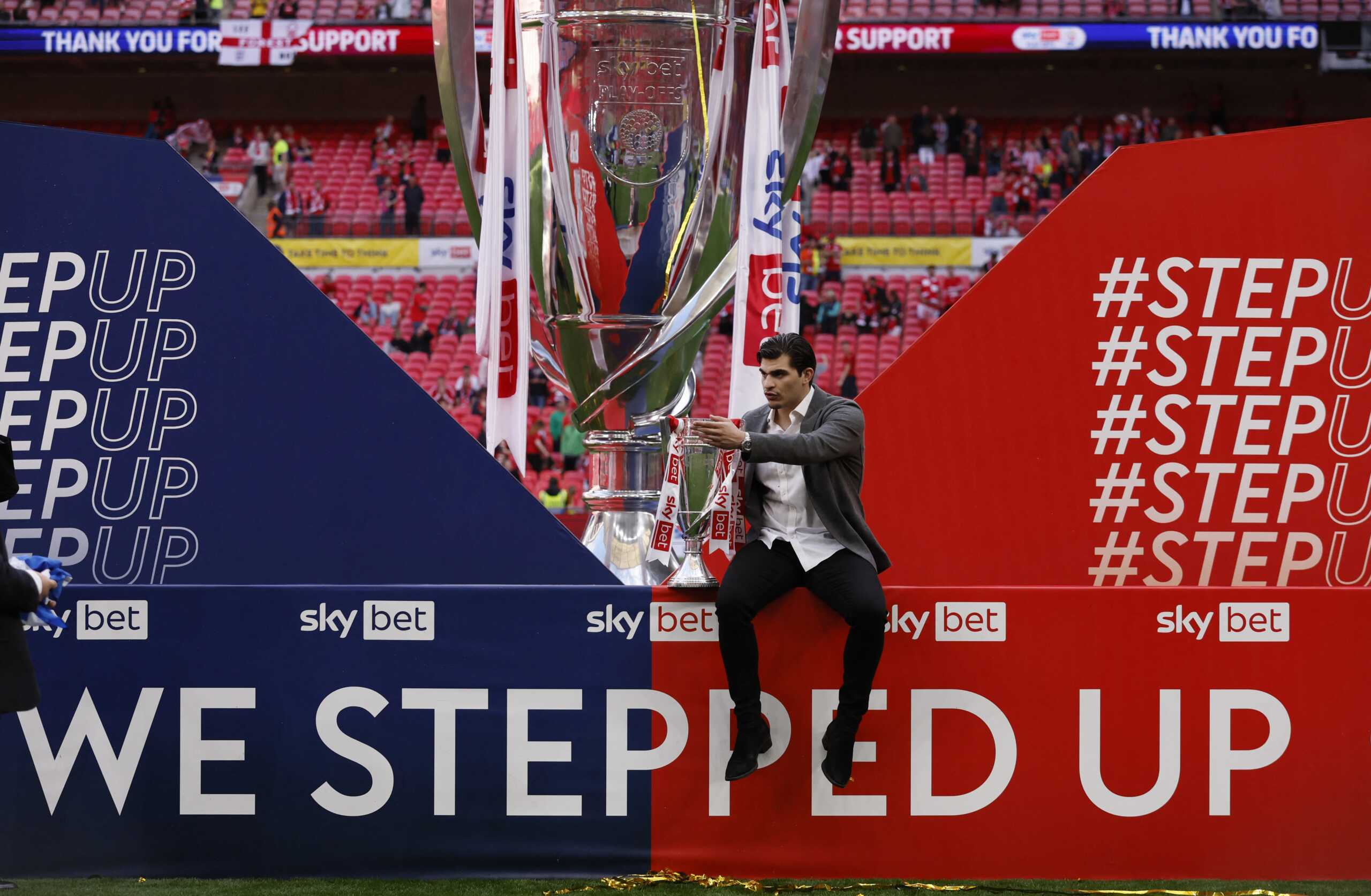 Soccer Football - Championship Play-Off Final - Huddersfield Town v Nottingham Forest - Wembley Stadium, London, Britain - May 29, 2022 Miltiadis Marinakis, son of Nottingham Forest owner Evangelos Marinakis celebrates with the trophy after winning the Championship Play-Off Final Action Images via Reuters