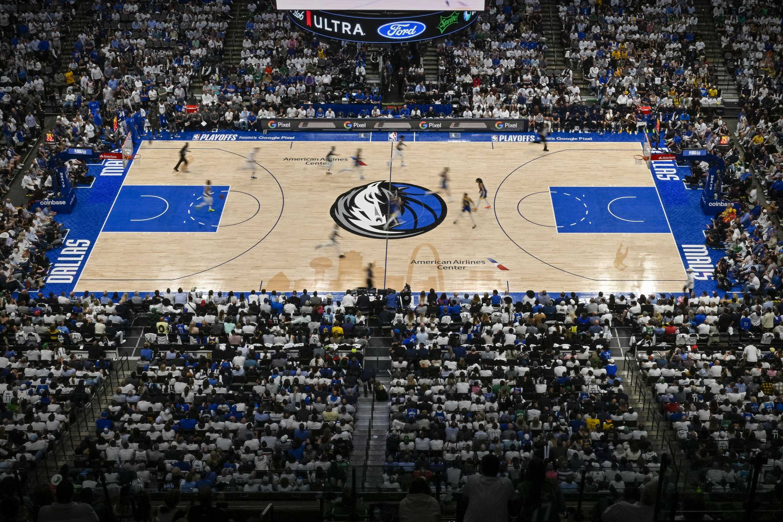 May 24, 2022; Dallas, Texas, USA; (editorÕs note, in camera motion blur) A general view of the Dallas Mavericks and the Golden State Warriors teams during the fourth quarter in game four of the 2022 western conference finals at American Airlines Center. Mandatory Credit: Jerome Miron-USA TODAY Sports