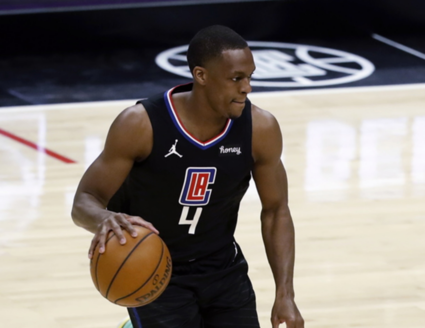 epa09123406 Los Angeles Clippers guard Rajon Rondo in action during the NBA game between the Phoenix Suns and the Los Angeles Clippers at the Staples Center in Los Angeles, California, USA, 08 April 2021.  EPA