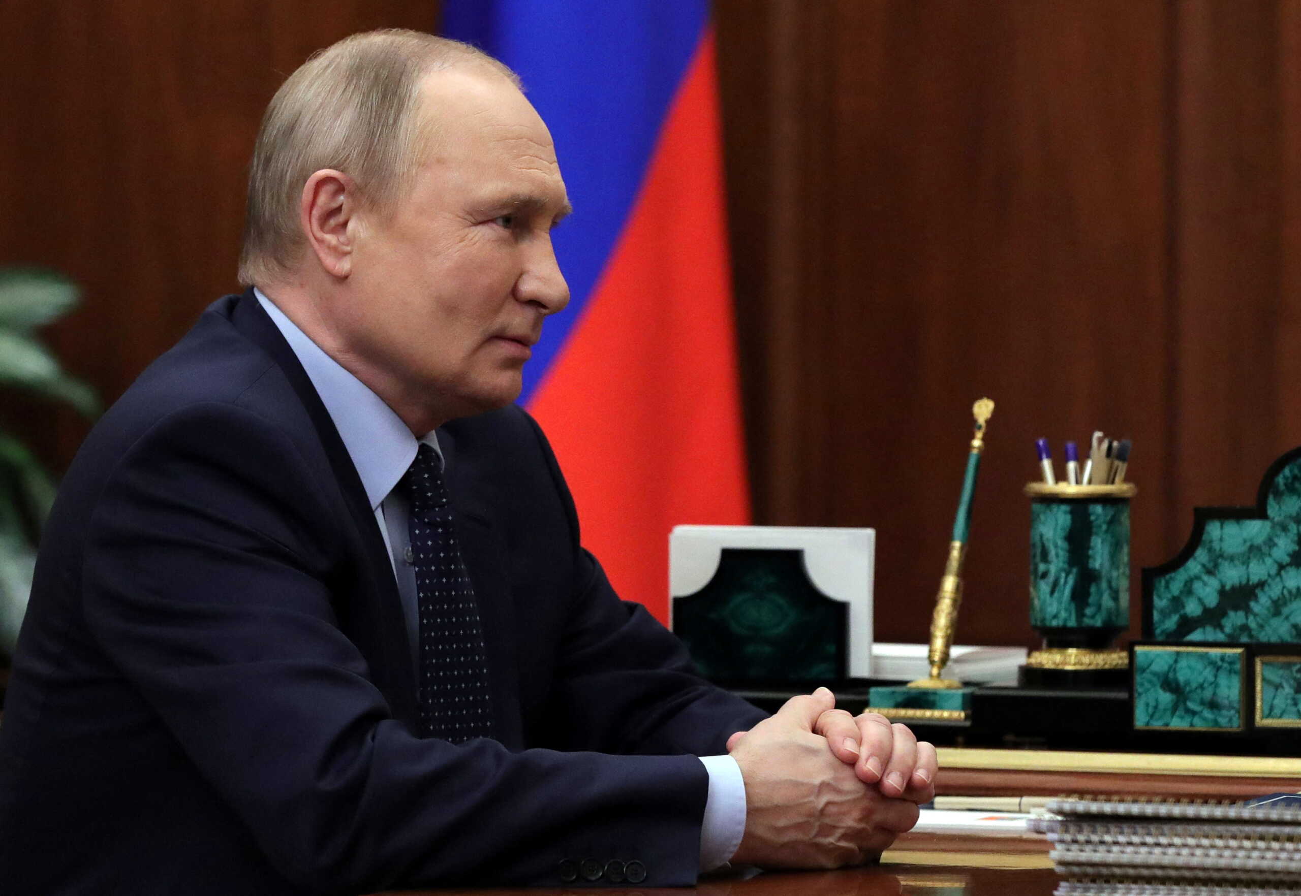 Russian President Vladimir Putin attends a meeting with Tver Region Governor Igor Rudenya, in Moscow, Russia May 6, 2022. Sputnik