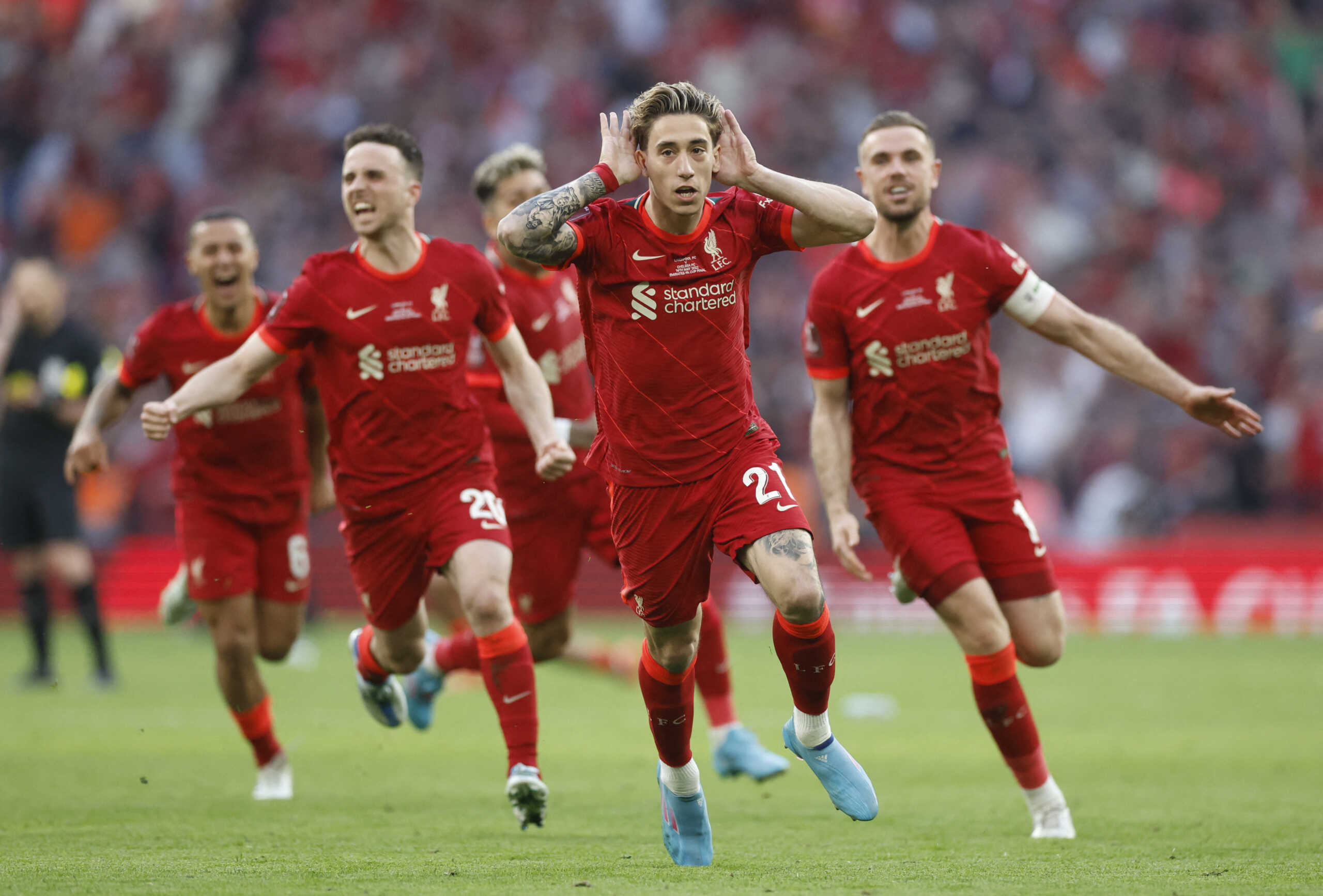 Soccer Football - FA Cup - Final - Chelsea v Liverpool - Wembley Stadium, London, Britain - May 14, 2022 Liverpool's Kostas Tsimikas celebrates after scoring the winning penalty in the shoot-out Action Images via Reuters
