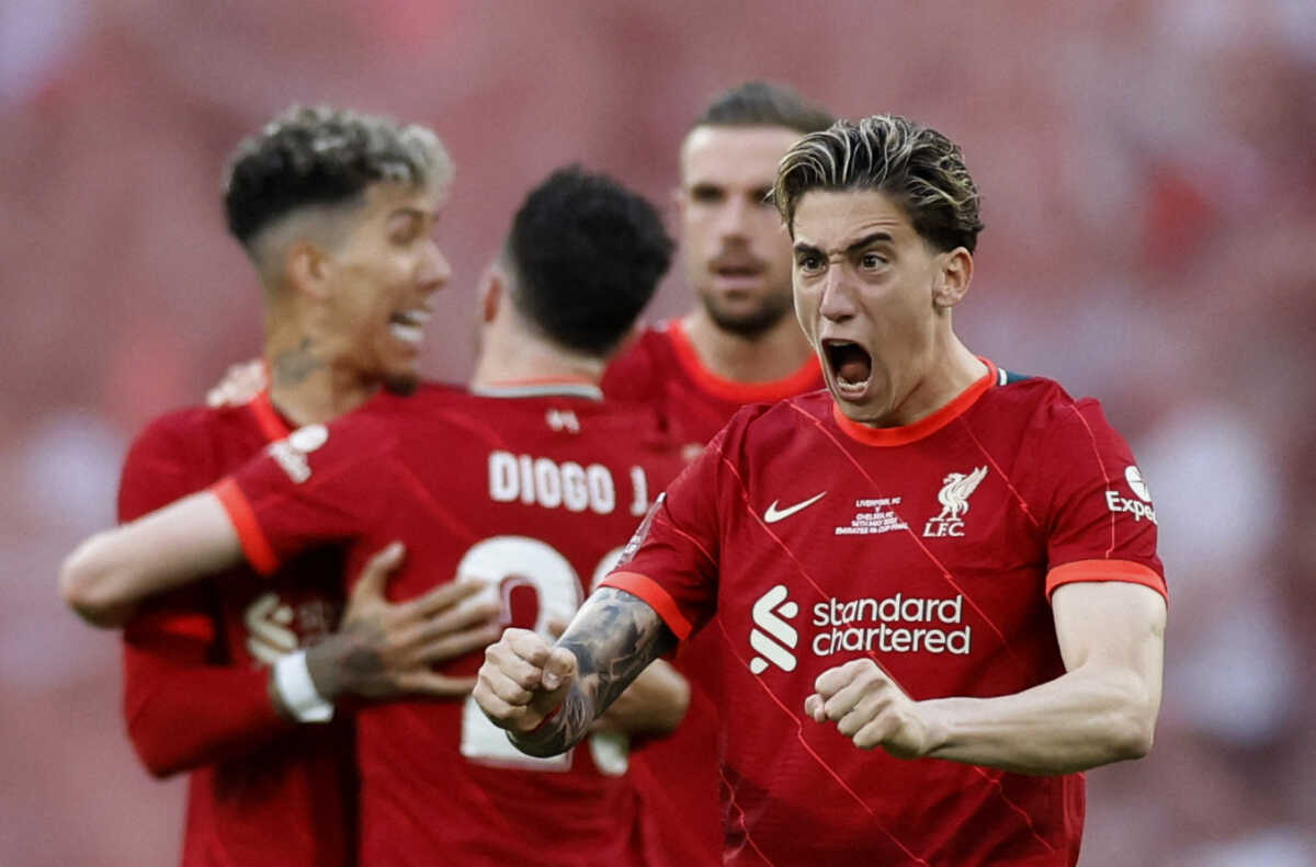 Soccer Football - FA Cup - Final - Chelsea v Liverpool - Wembley Stadium, London, Britain - May 14, 2022 Liverpool's Kostas Tsimikas reacts after Trent Alexander-Arnold scores a penalty during the shoot-out Action Images via Reuters