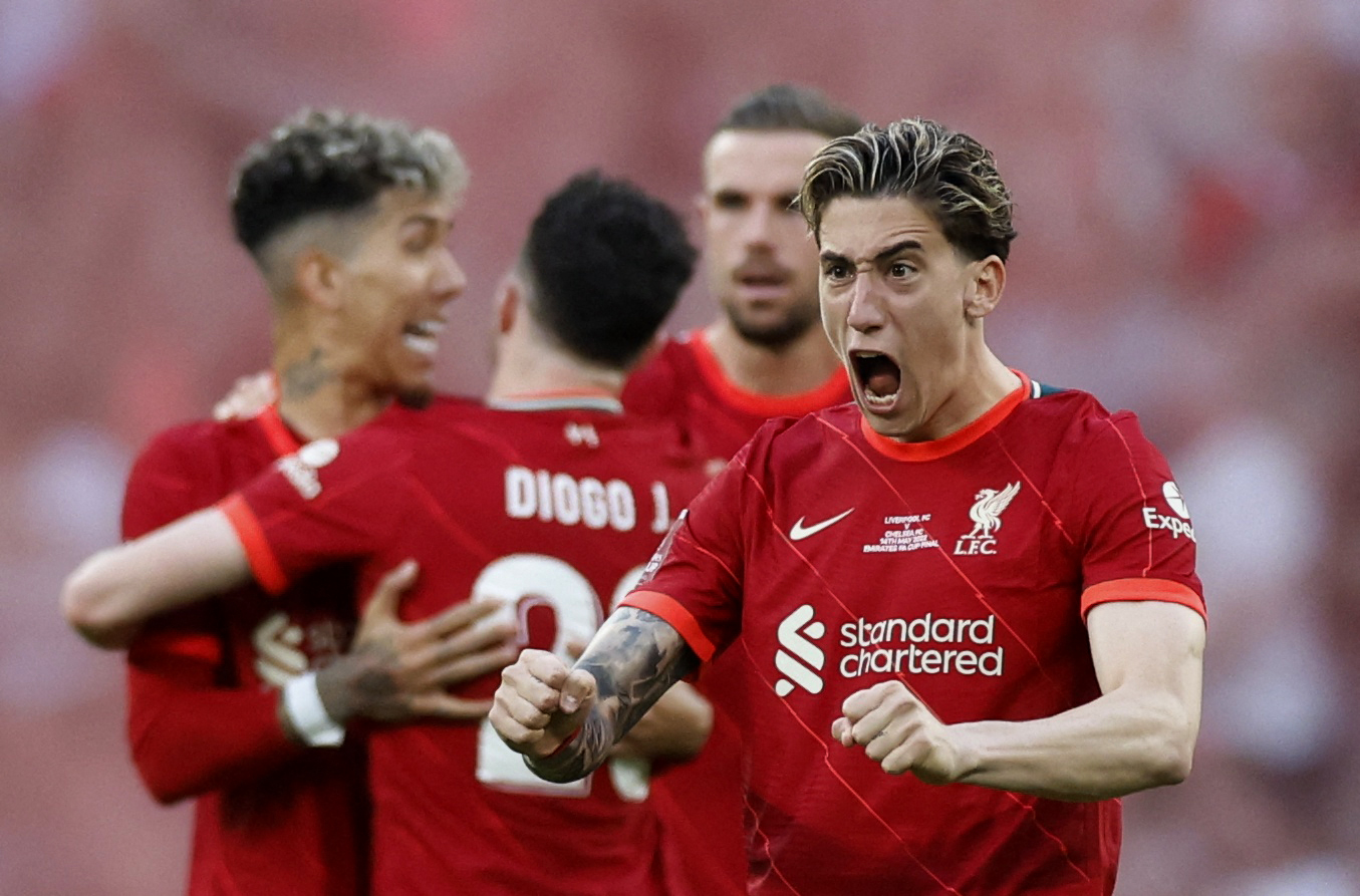 Soccer Football - FA Cup - Final - Chelsea v Liverpool - Wembley Stadium, London, Britain - May 14, 2022 Liverpool's Kostas Tsimikas reacts after Trent Alexander-Arnold scores a penalty during the shoot-out Action Images via Reuters