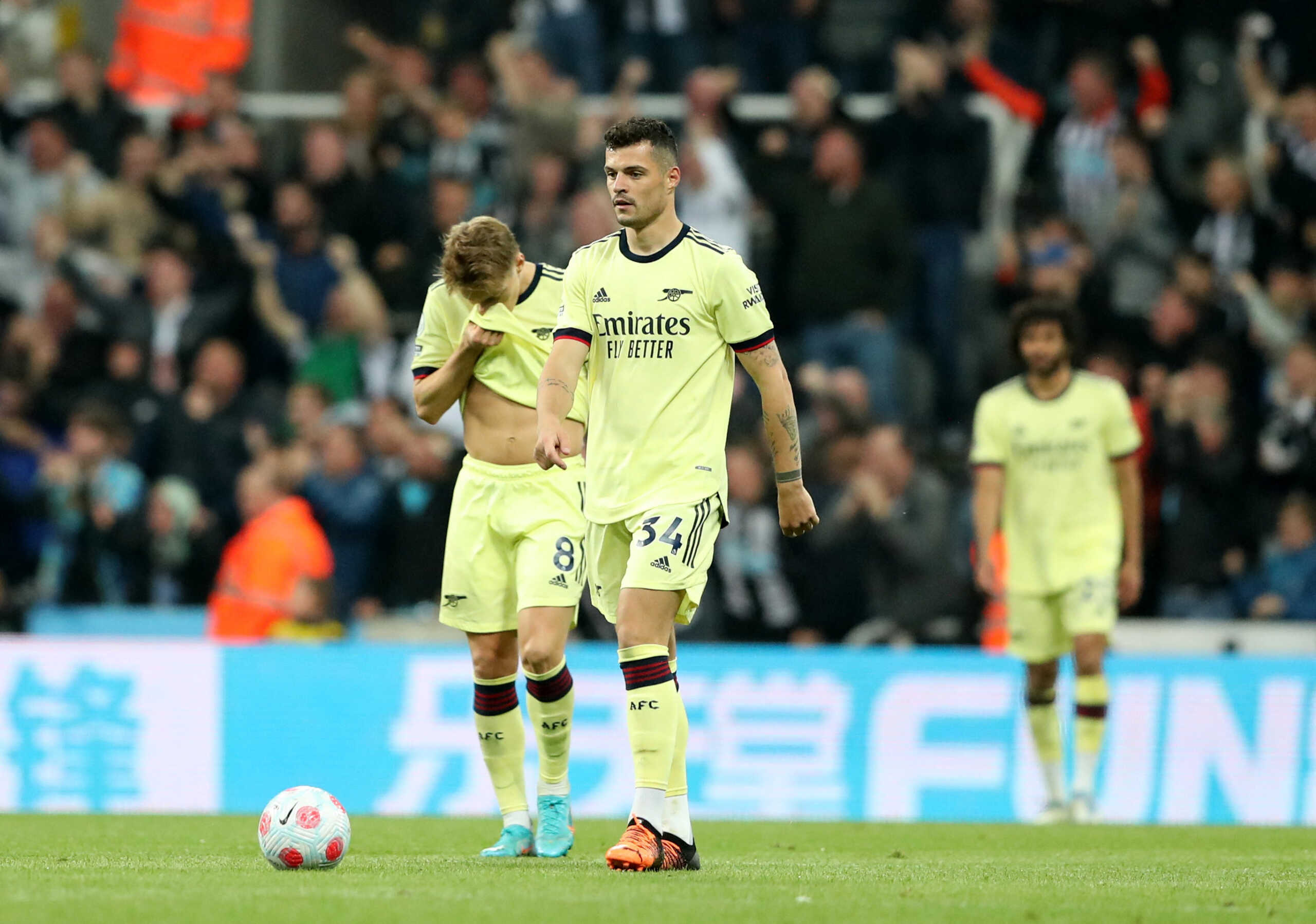 Soccer Football - Premier League - Newcastle United v Arsenal - St James' Park, Newcastle, Britain - May 16, 2022 Arsenal's Granit Xhaka looks dejected after Gabriel scores an own goal and Newcastle United's first REUTERS