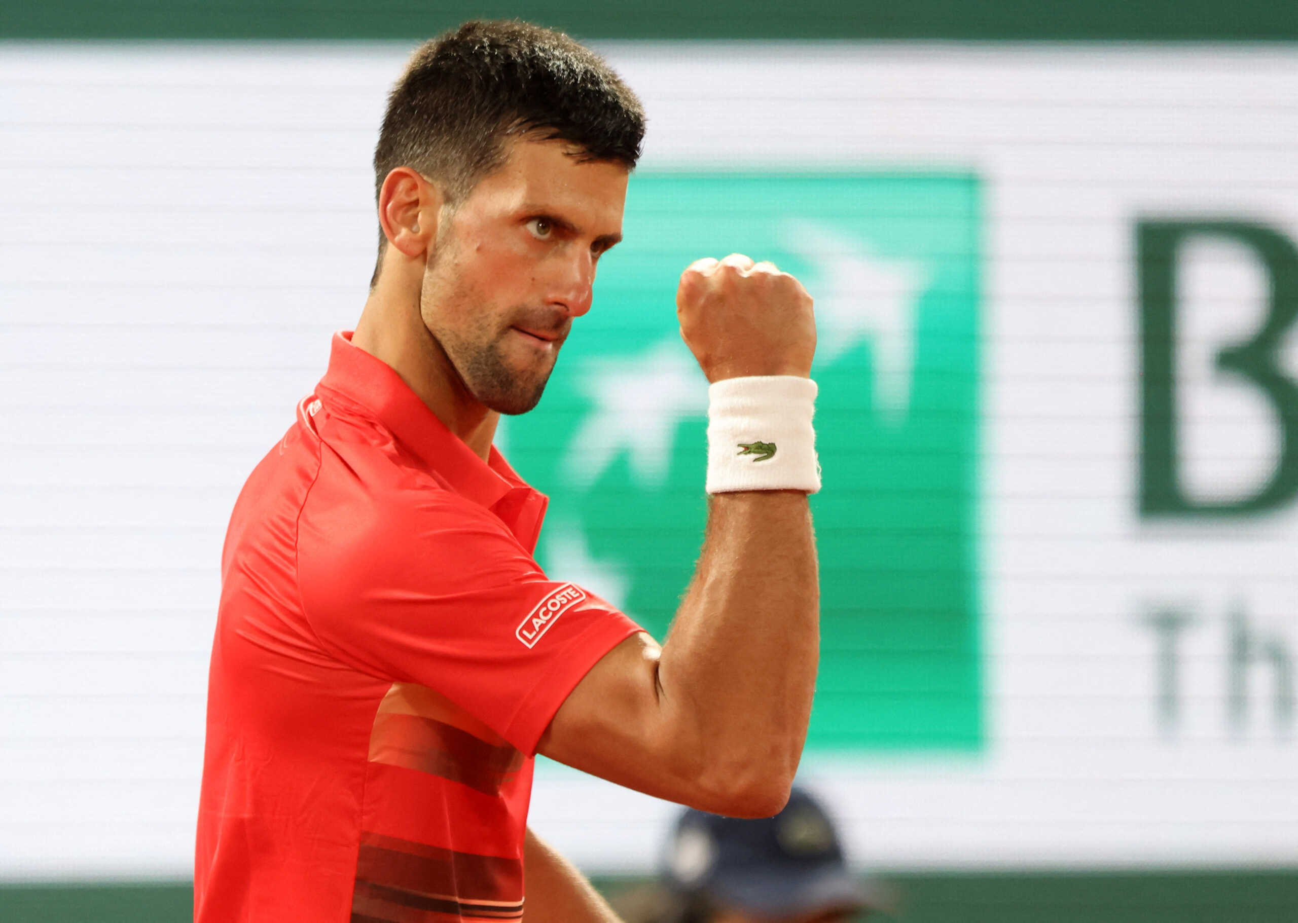 Tennis - French Open - Roland Garros, Paris, France - May 23, 2022 Serbia's Novak Djokovic reacts during his first round match against Japan's Yoshihito Nishioka REUTERS