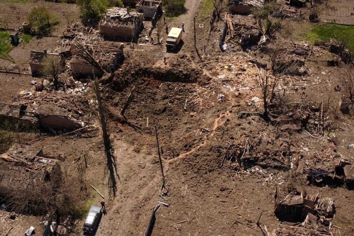A hole is seen at the site where a missile strike hit a residential area, amid Russia's invasion of Ukraine, in Bakhmut in the Donetsk region, Ukraine, May 7, 2022. Picture taken with a drone. REUTERS