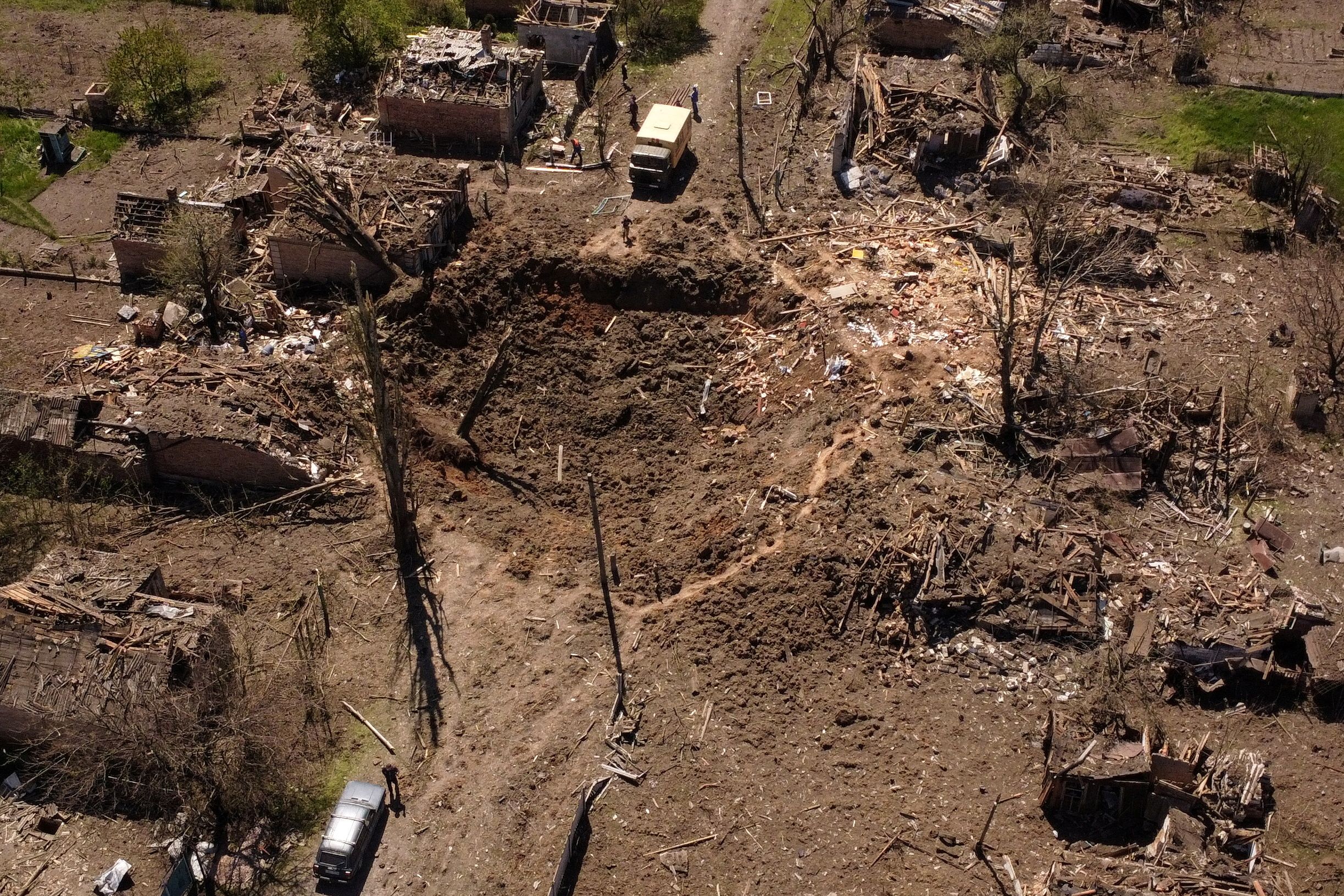 A hole is seen at the site where a missile strike hit a residential area, amid Russia's invasion of Ukraine, in Bakhmut in the Donetsk region, Ukraine, May 7, 2022. Picture taken with a drone. REUTERS