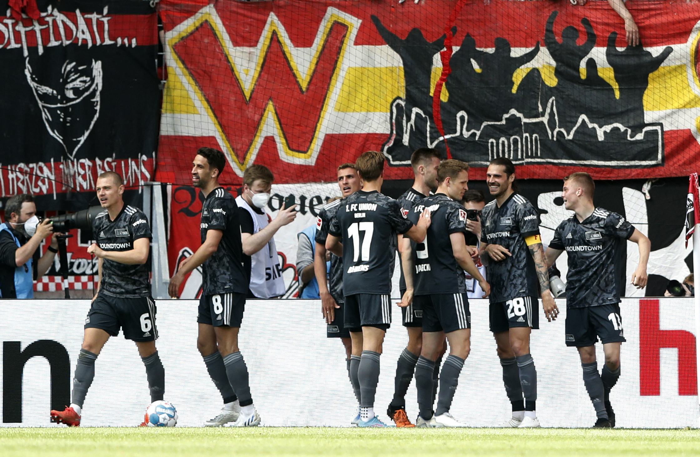 Soccer Football - Bundesliga - SC Freiburg v 1. FC Union Berlin - Europa Park Stadion, Freiburg, Germany - May 7, 2022 1. FC Union Berlin's players celebrate their fourth goal scored by Andras Schafer REUTERS