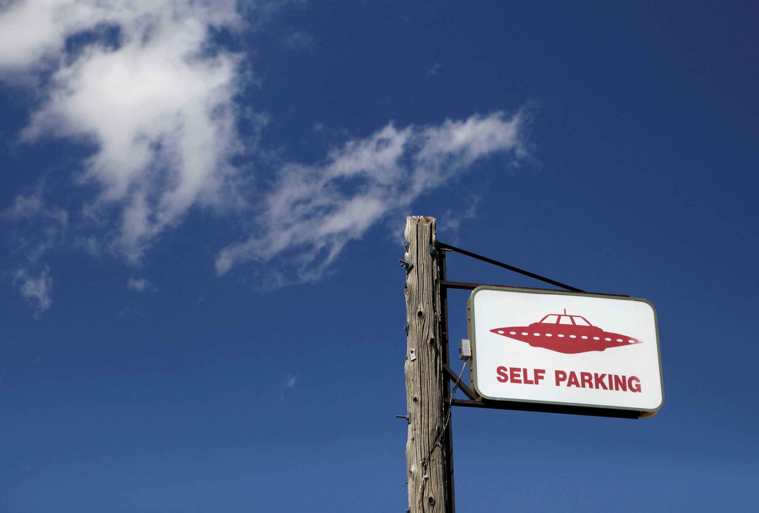 FILE PHOTO: A parking sign at the Little A'Le'Inn as an influx of tourists responding to a call to 'storm' Area 51, a secretive U.S. military base believed by UFO enthusiasts to hold government secrets about extra-terrestrials, is expected in Rachel, Nevada, U.S. September 19, 2019. REUTERS