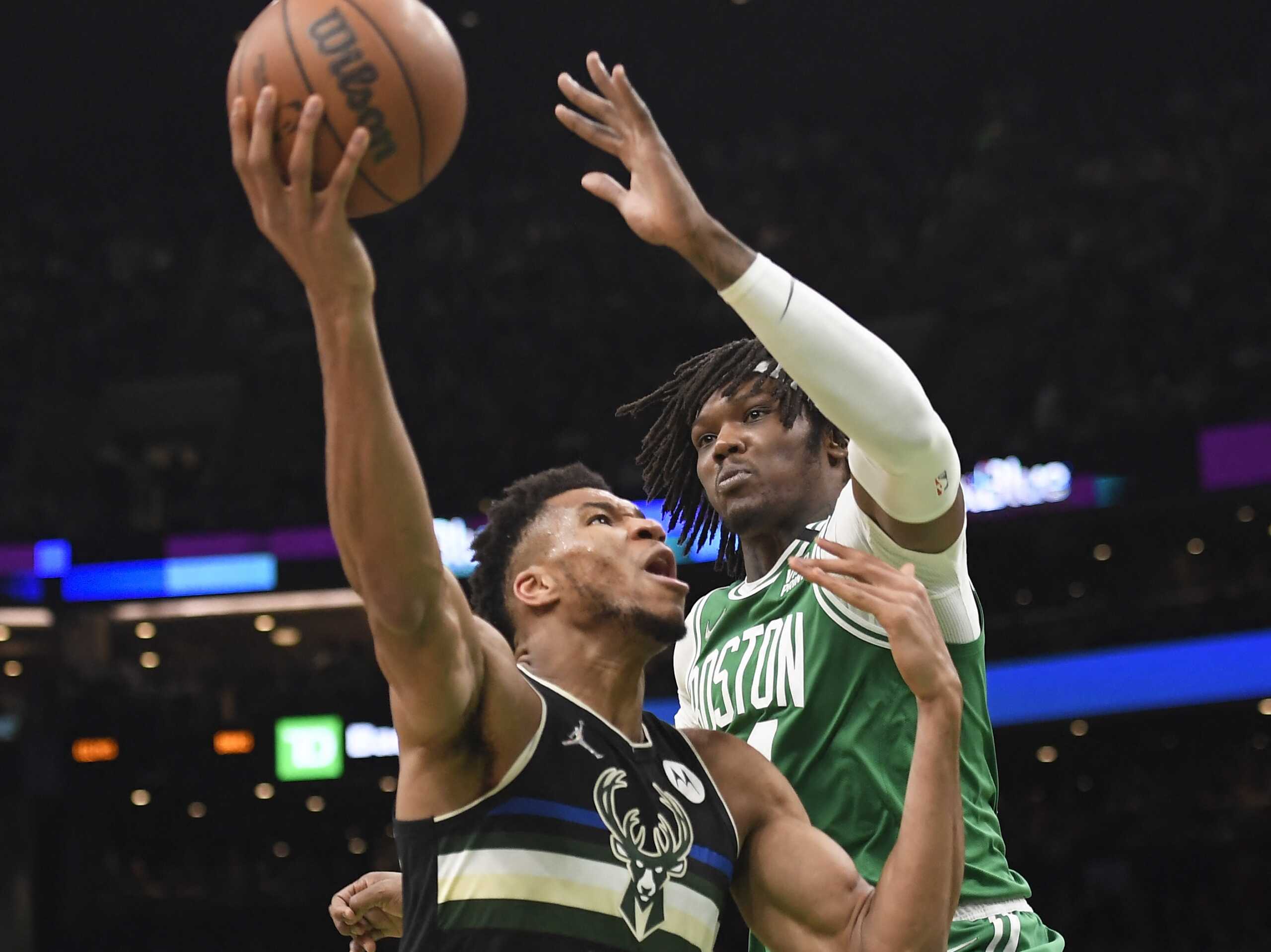 May 3, 2022; Boston, Massachusetts, USA; Milwaukee Bucks forward Giannis Antetokounmpo (34) drives to the basket while Boston Celtics center Robert Williams III (44) defends in the second half during game two of the second round for the 2022 NBA playoffs at TD Garden. Mandatory Credit: Bob DeChiara-USA TODAY Sports