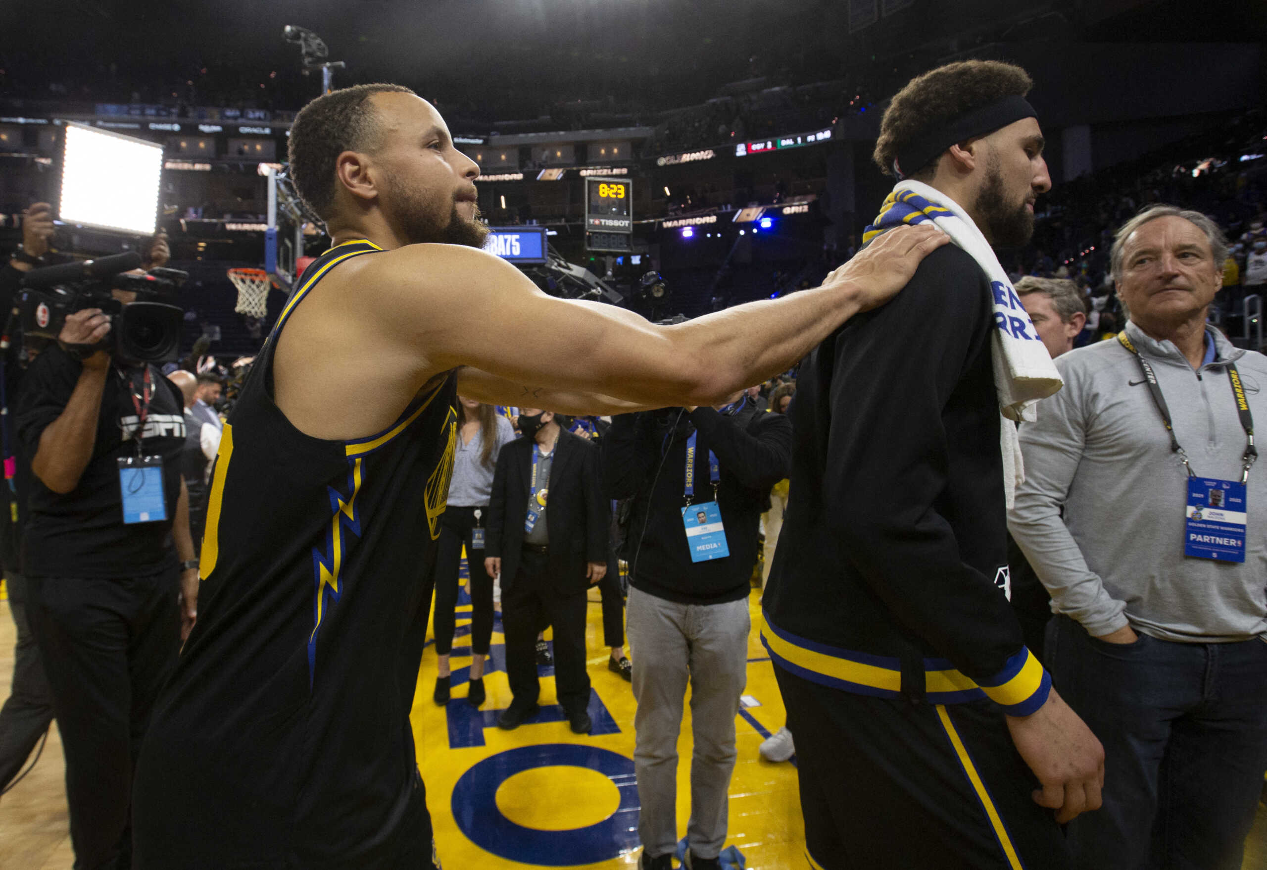 May 7, 2022; San Francisco, California, USA; Golden State Warriors guard Stephen Curry (left) and guard Klay Thompson (right) walk off the court following a 142-112 victory over the Memphis Grizzlies in game three of the second round for the 2022 NBA playoffs at Chase Center. Mandatory Credit: D. Ross Cameron-USA TODAY Sports