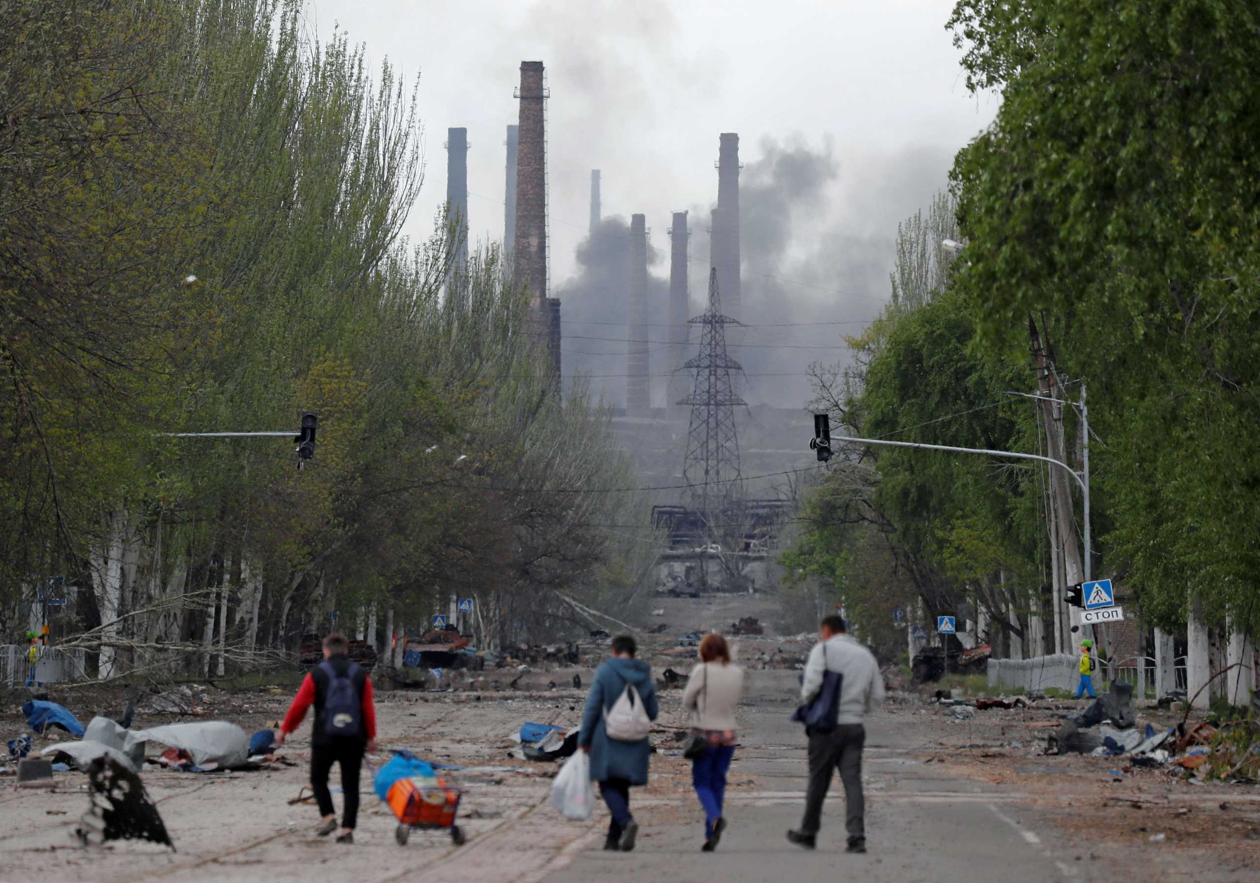 Smoke rises above a plant of Azovstal Iron and Steel Works during Ukraine-Russia conflict in the southern port city of Mariupol, Ukraine May 2, 2022. REUTERS
