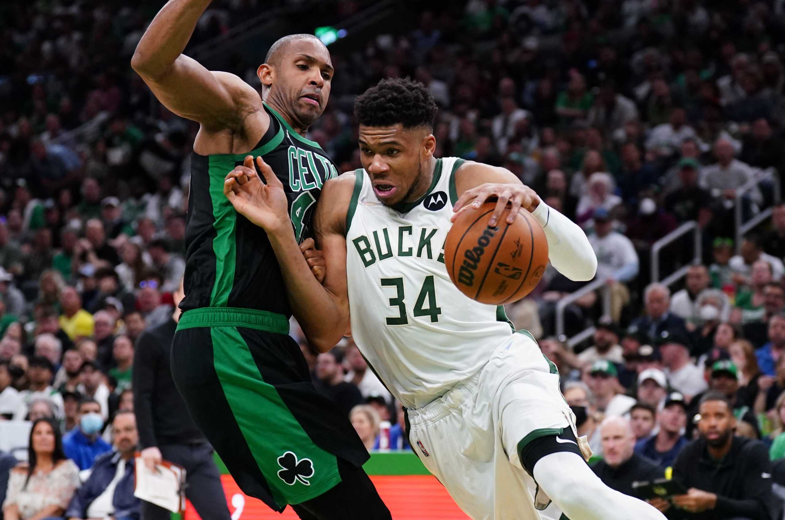 May 1, 2022; Boston, Massachusetts, USA; Milwaukee Bucks forward Giannis Antetokounmpo (34) drives the ball against Boston Celtics center Al Horford (42) in the second half during game one of the second round for the 2022 NBA playoffs at TD Garden. Mandatory Credit: David Butler II-USA TODAY Sports