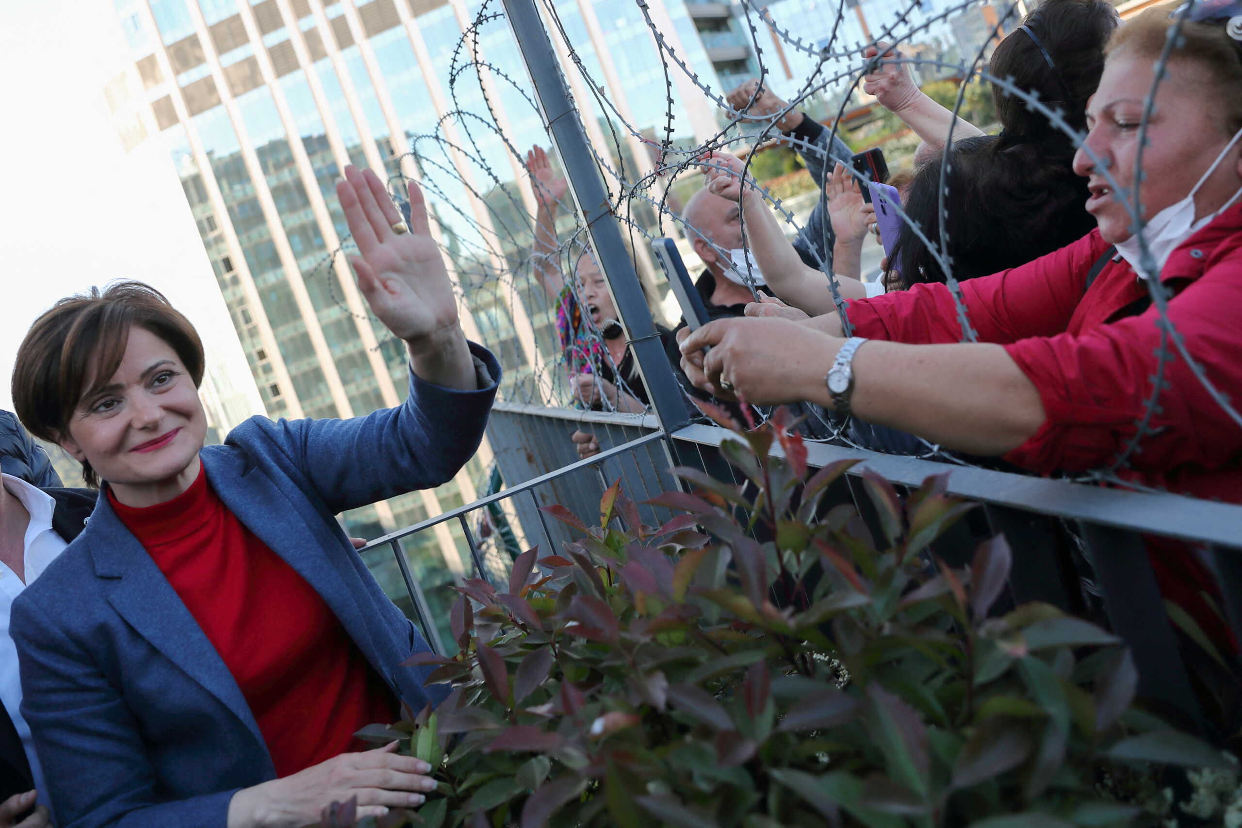 Canan Kaftancioglu, chair of the main opposition Republican People's Party's (CHP) Istanbul branch, greets her supporters as she arrives at the party building in Istanbul, Turkey May 12, 2022. REUTERS